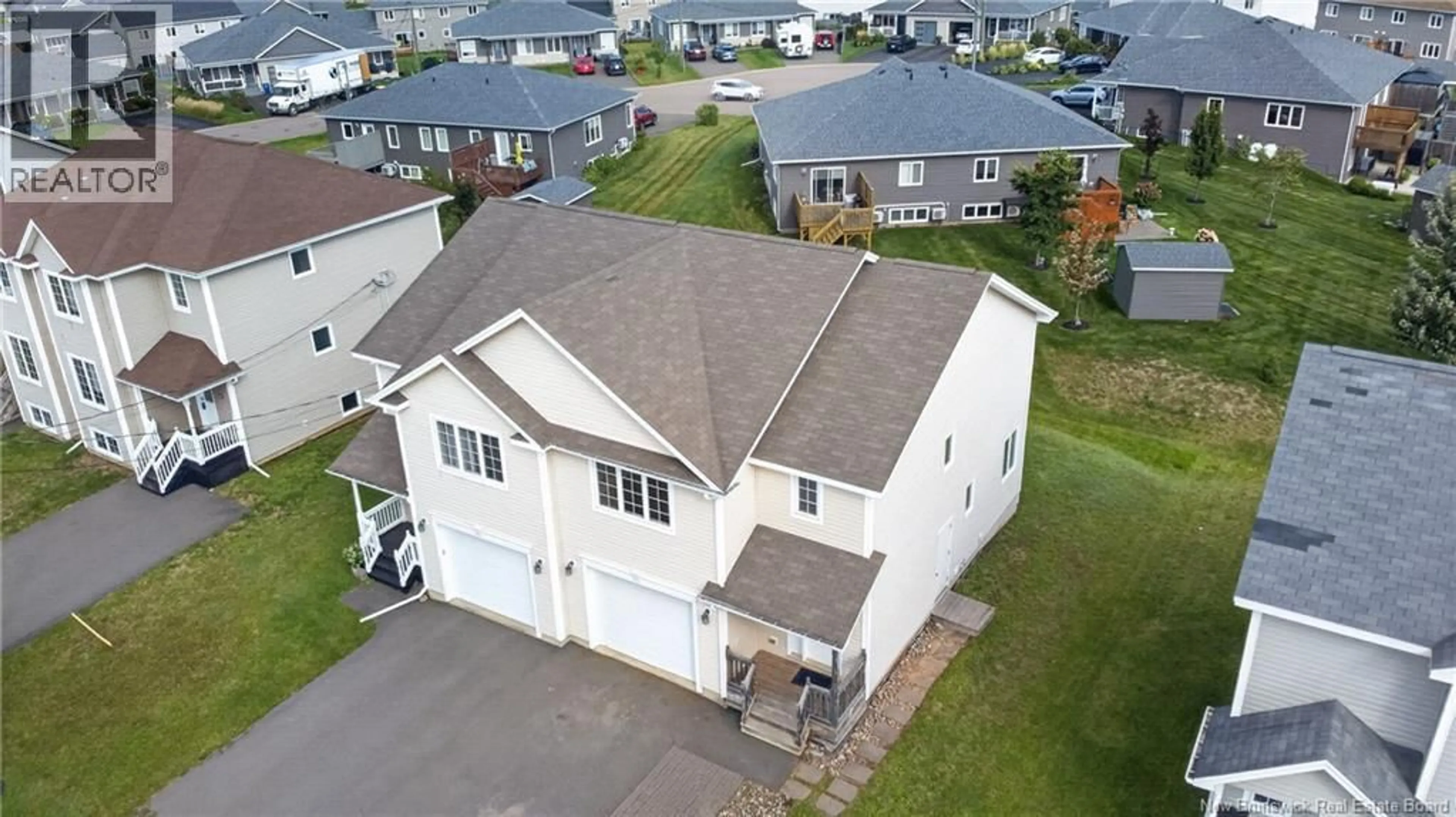 A pic from outside/outdoor area/front of a property/back of a property/a pic from drone, street for 88 HARMONY DRIVE, Riverview New Brunswick E1B0N1