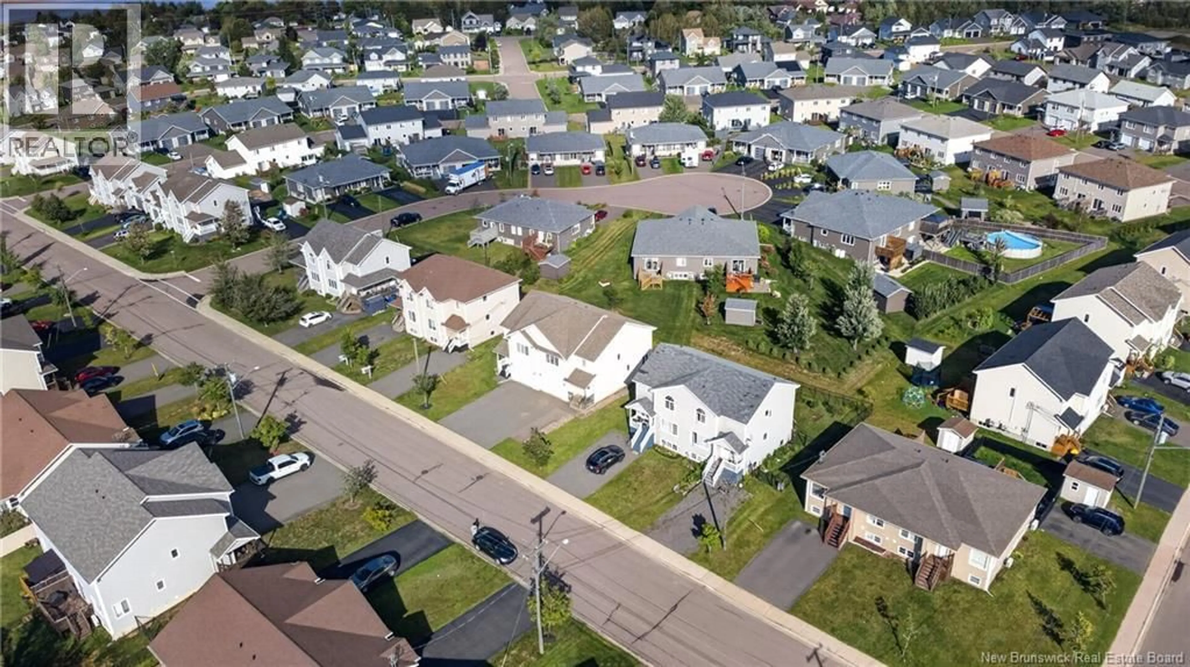 A pic from outside/outdoor area/front of a property/back of a property/a pic from drone, street for 88 HARMONY DRIVE, Riverview New Brunswick E1B0N1