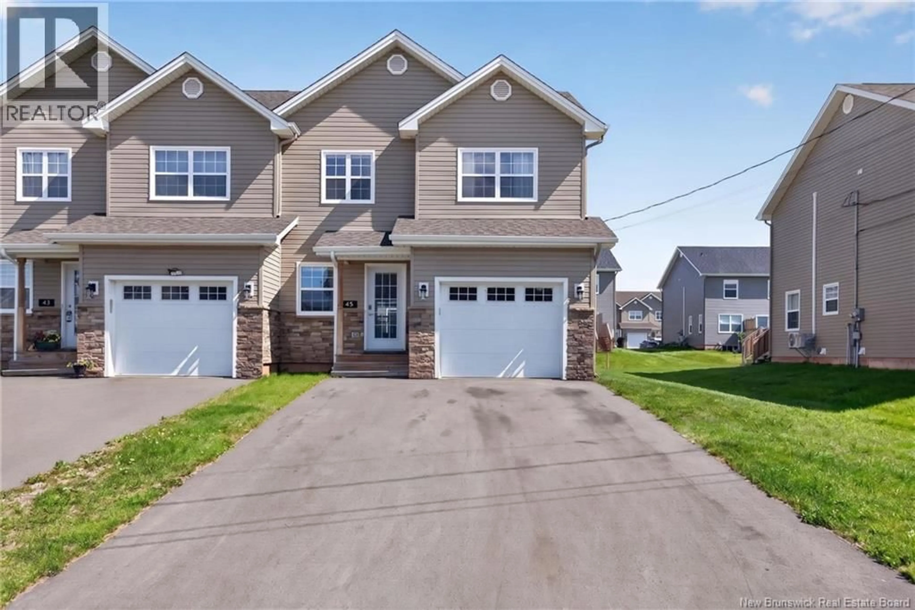 Home with vinyl exterior material, street for 45 BASTARACHE STREET, Dieppe New Brunswick E1A6Y6