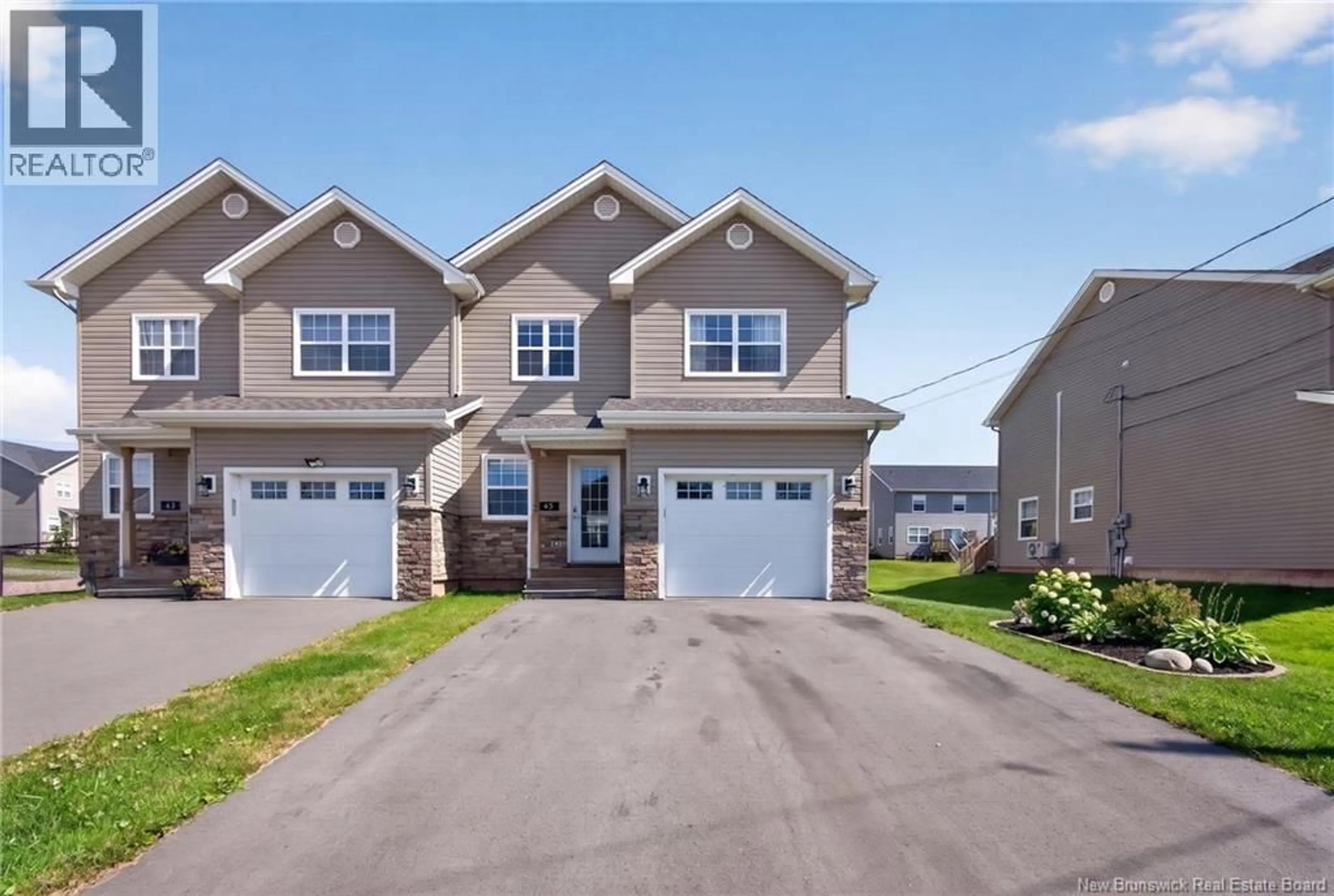 Home with vinyl exterior material, street for 45 BASTARACHE STREET, Dieppe New Brunswick E1A6Y6