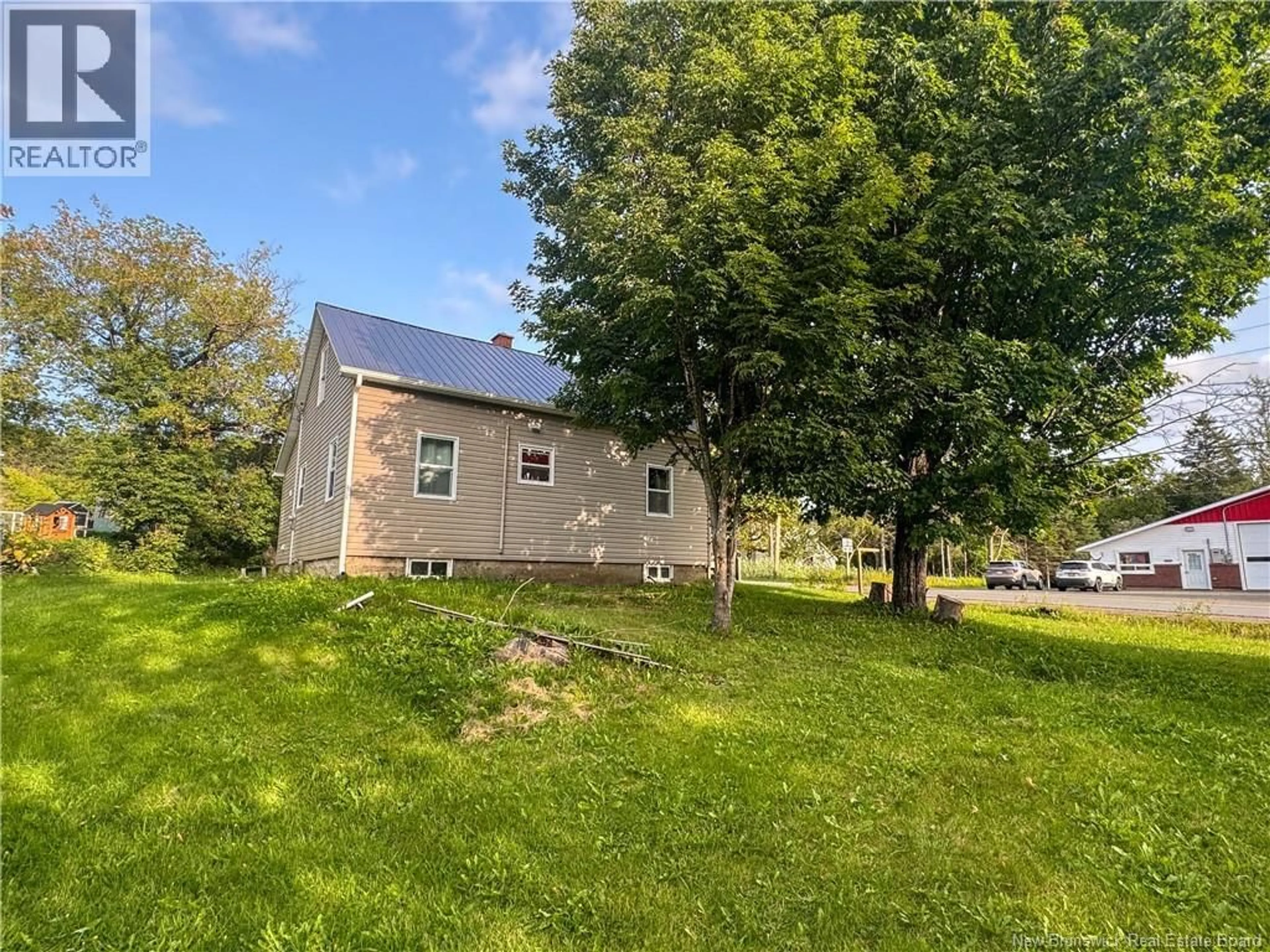 A pic from outside/outdoor area/front of a property/back of a property/a pic from drone, street for 8584 ROUTE 107, Glassville New Brunswick E7L1A7