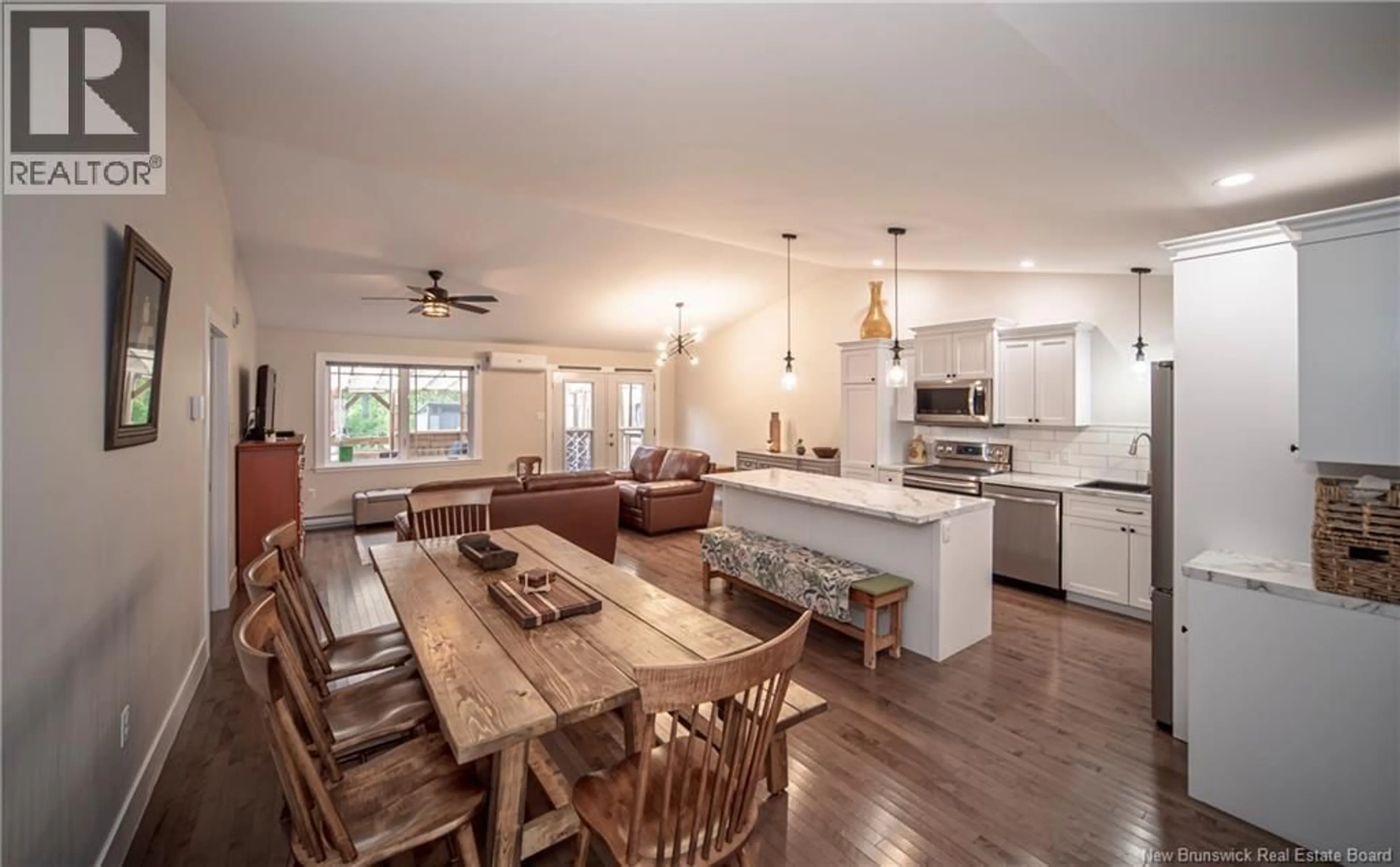 Open concept kitchen, wood/laminate floor for 9 COOK COURT, Oromocto New Brunswick E2V0N1
