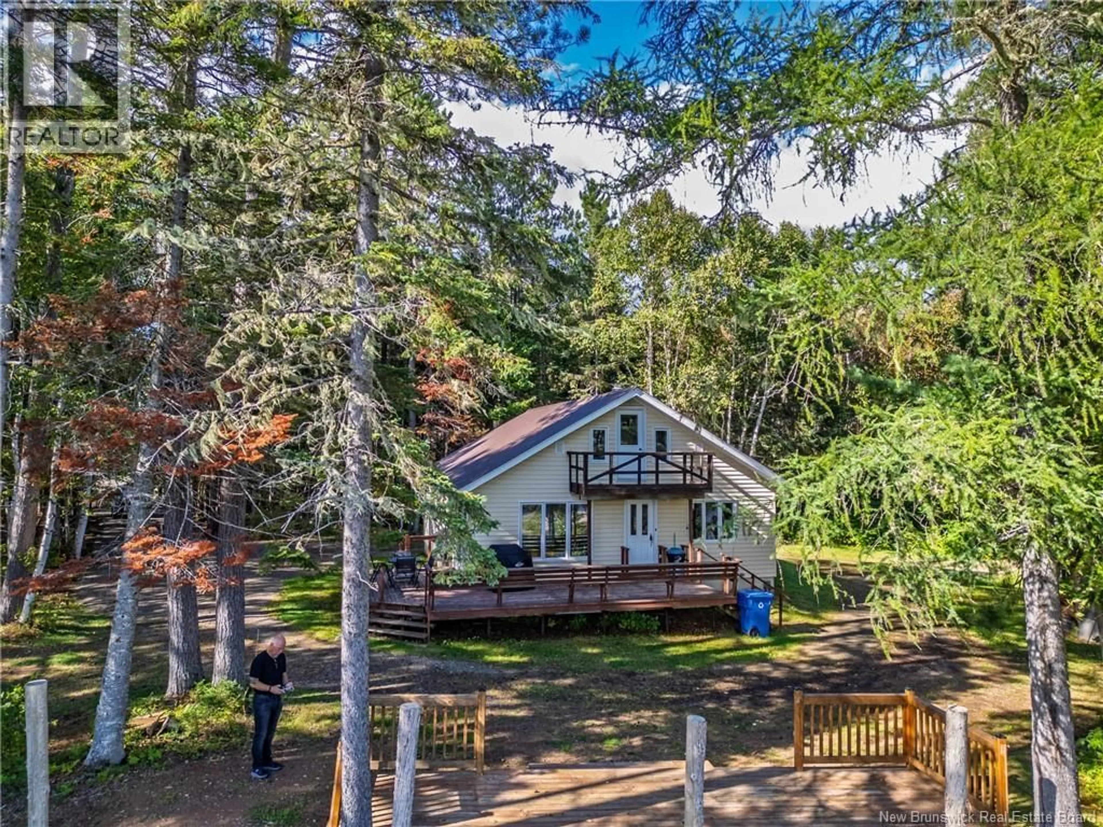 A pic from outside/outdoor area/front of a property/back of a property/a pic from drone, water/lake/river/ocean view for 912 ROUTE 385, Burntland Brook New Brunswick E3Y3G8