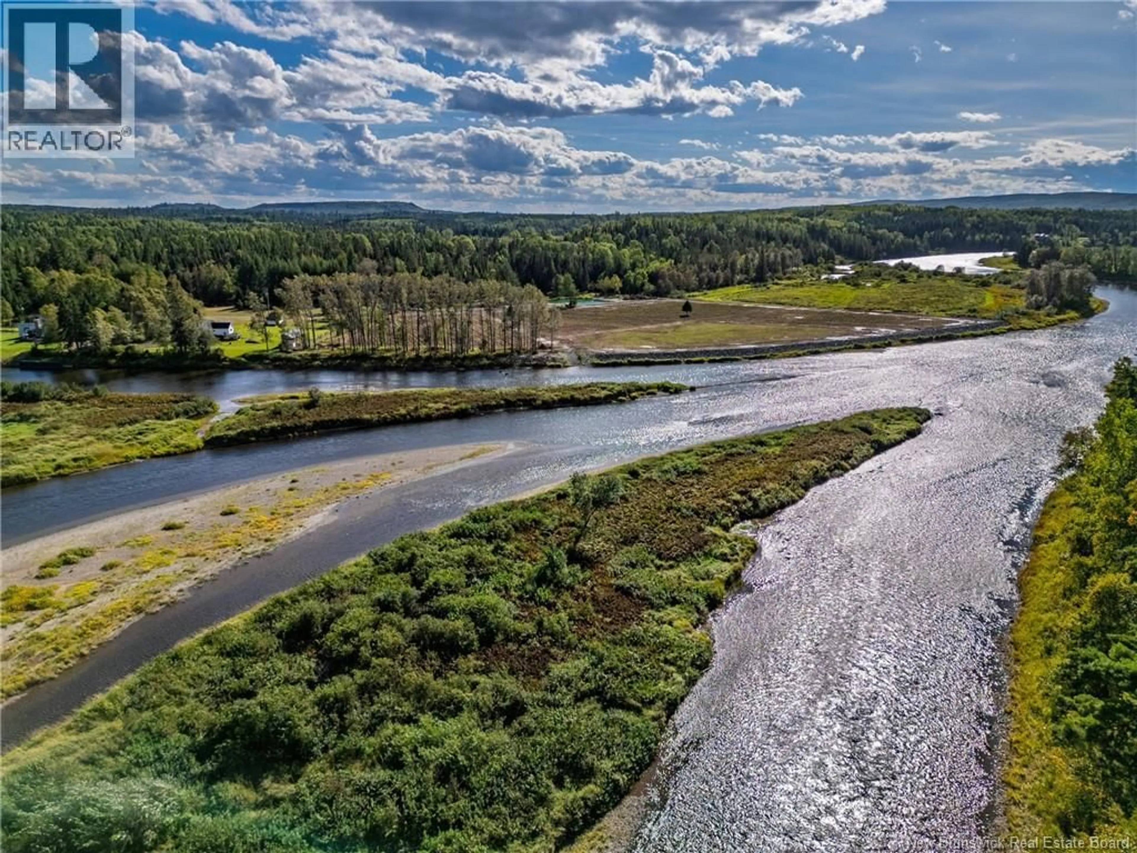 A pic from outside/outdoor area/front of a property/back of a property/a pic from drone, water/lake/river/ocean view for 912 ROUTE 385, Burntland Brook New Brunswick E3Y3G8
