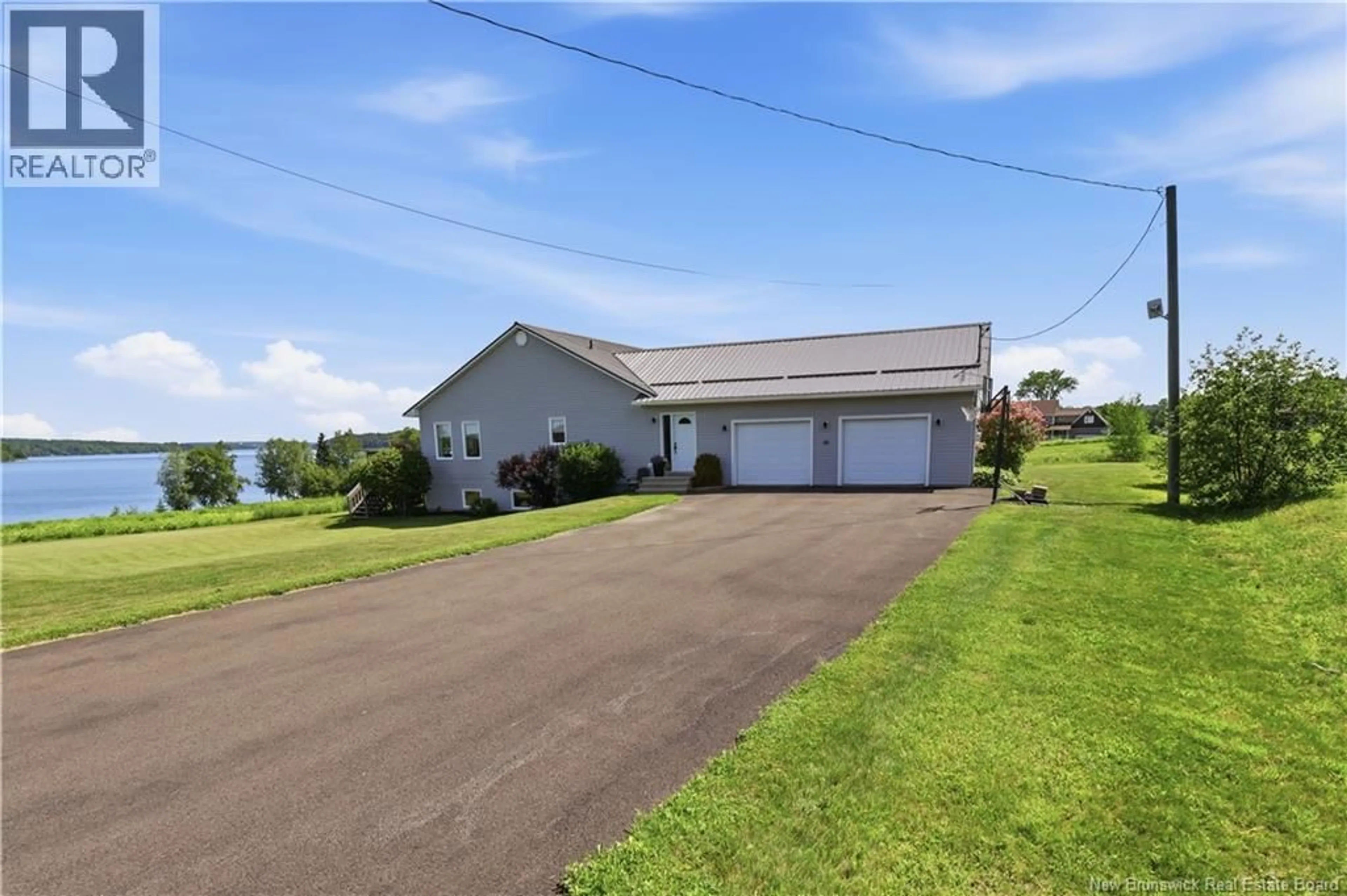 A pic from outside/outdoor area/front of a property/back of a property/a pic from drone, water/lake/river/ocean view for 10 RIPPLE LANE, Upper Kingsclear New Brunswick E3E2R6