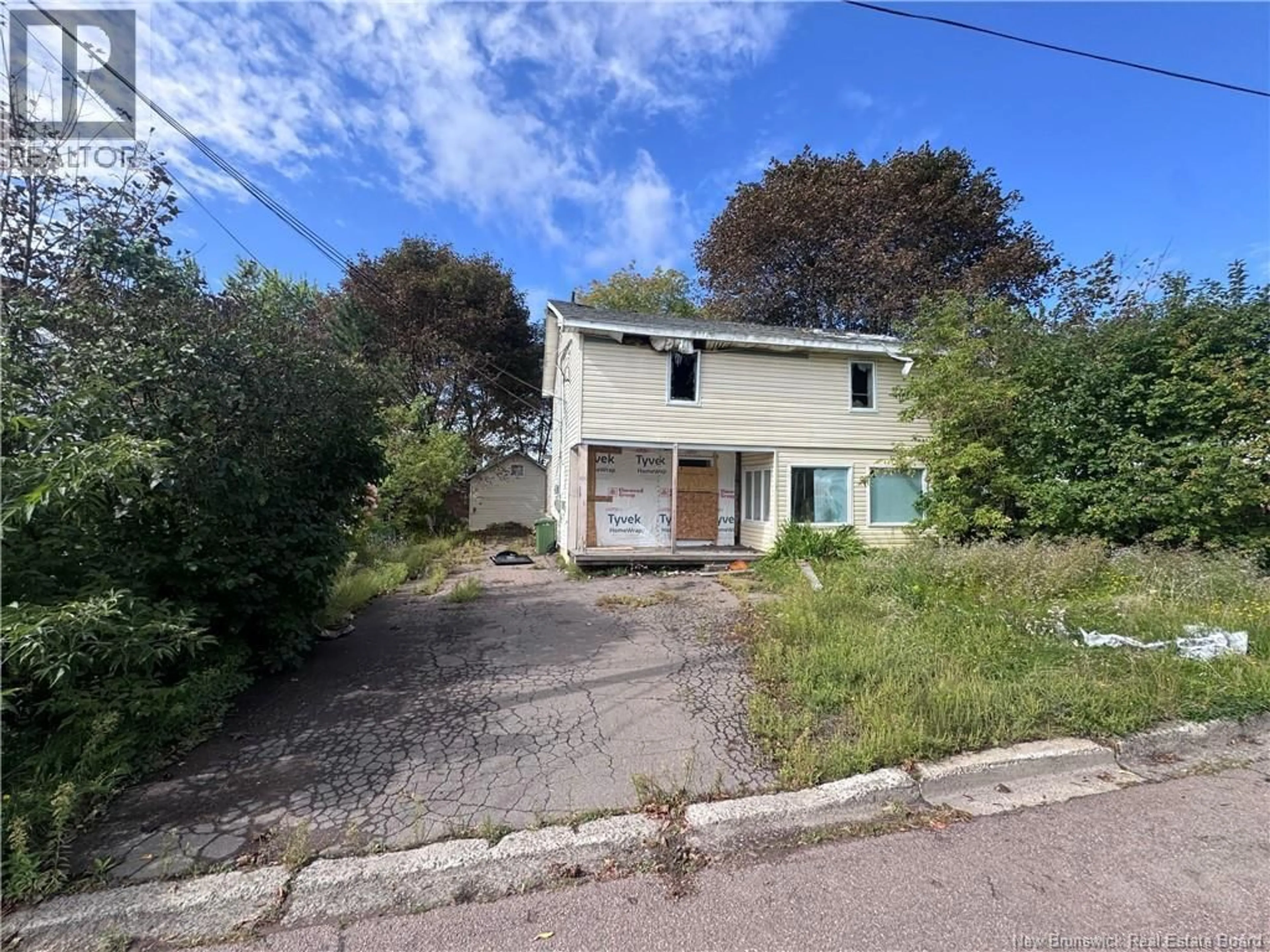 A pic from outside/outdoor area/front of a property/back of a property/a pic from drone, street for 106 BRAEMAR DRIVE, Moncton New Brunswick E1A3C3