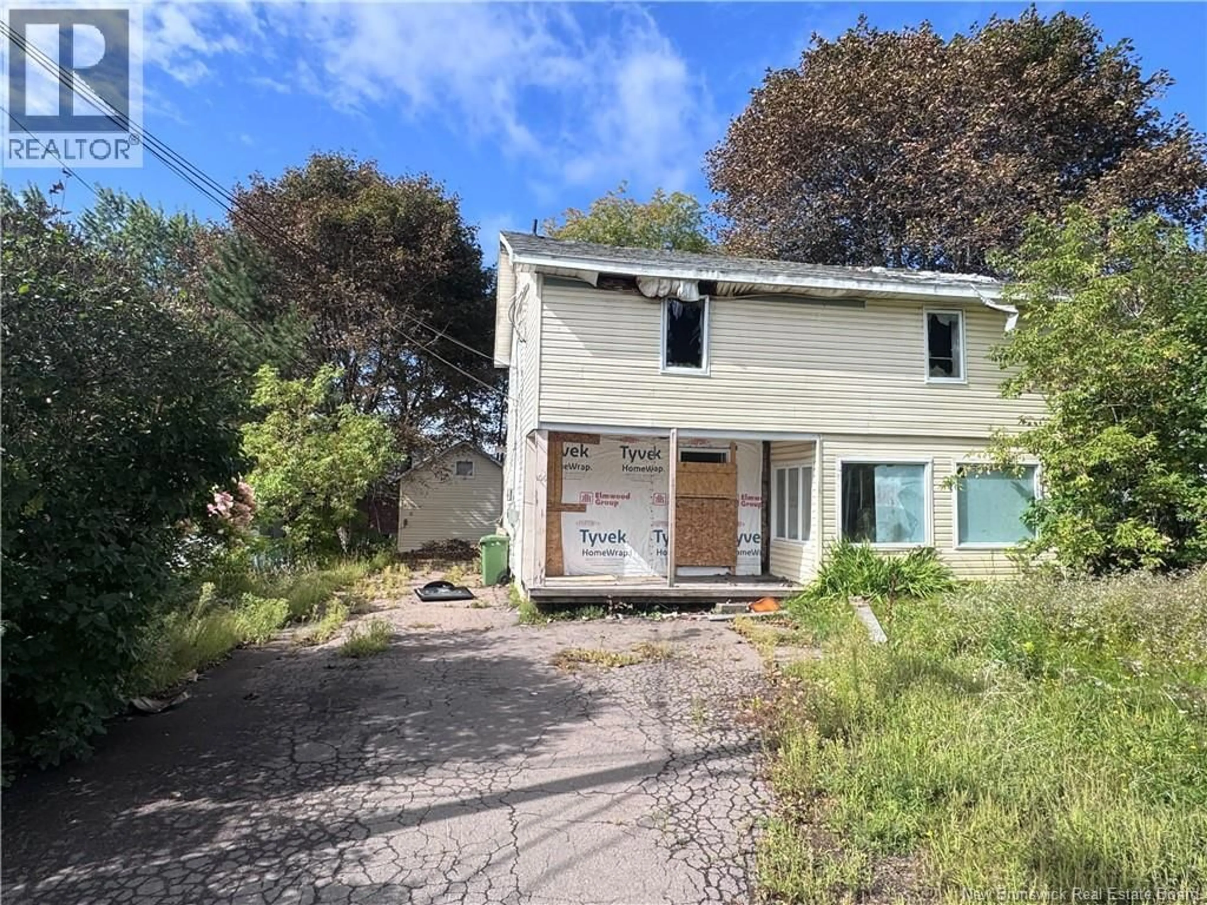 A pic from outside/outdoor area/front of a property/back of a property/a pic from drone, street for 106 BRAEMAR DRIVE, Moncton New Brunswick E1A3C3