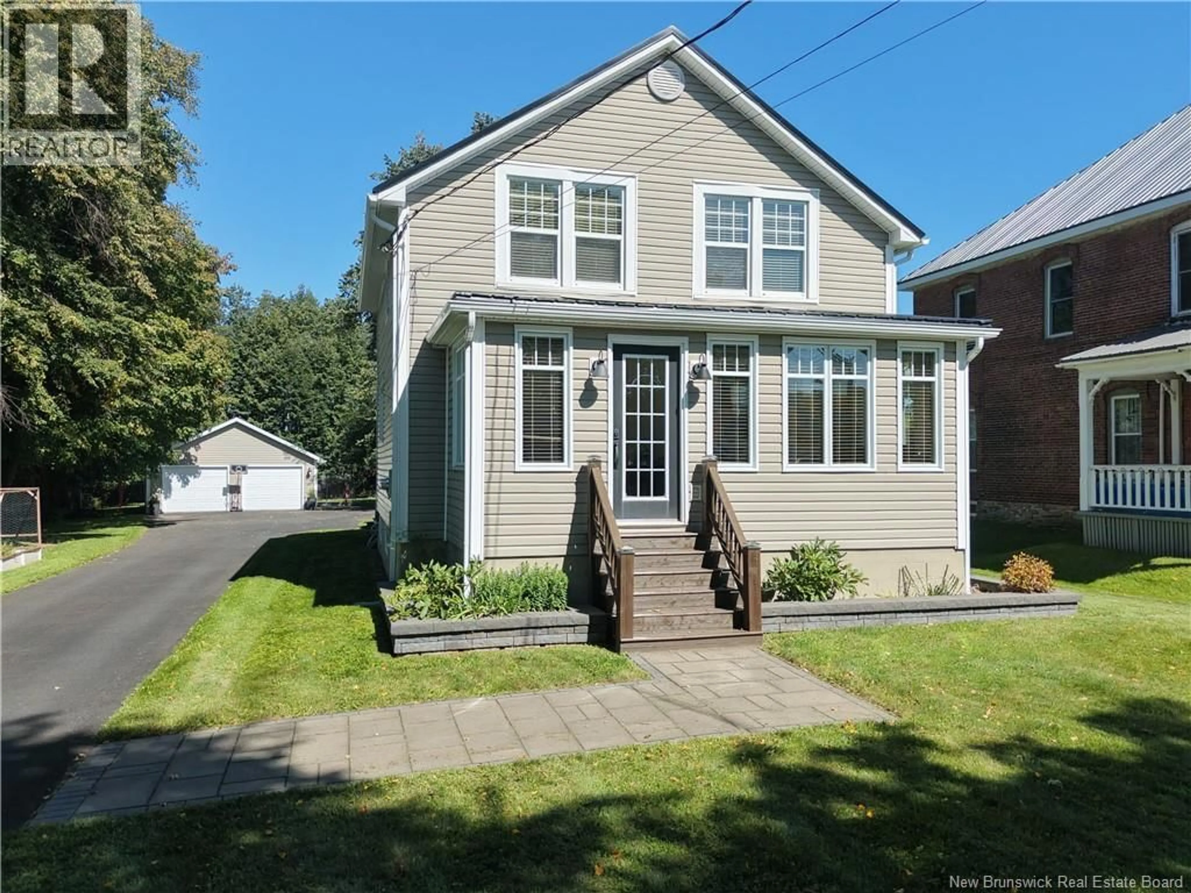 Home with vinyl exterior material, street for 1082 MAIN STREET, Sussex Corner New Brunswick E4E2Z8