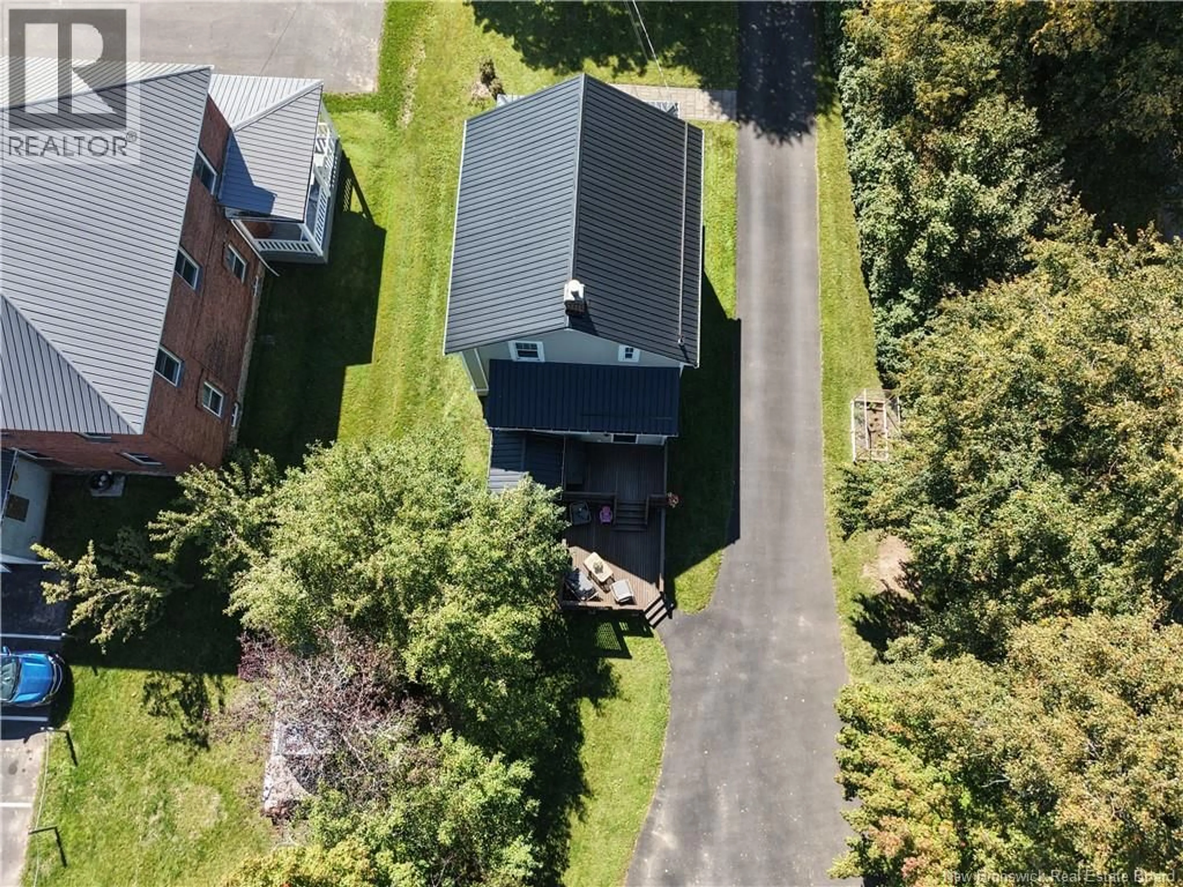 A pic from outside/outdoor area/front of a property/back of a property/a pic from drone, unknown for 1082 MAIN STREET, Sussex Corner New Brunswick E4E2Z8