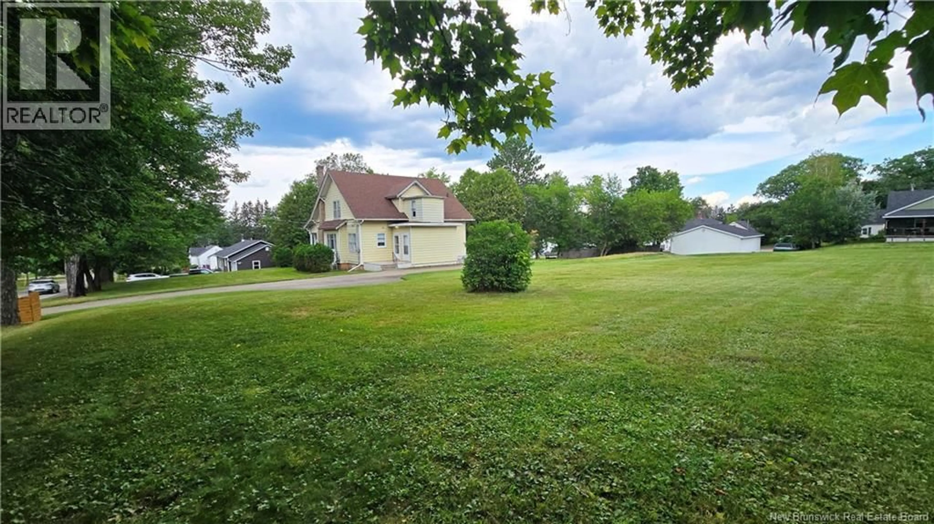 A pic from outside/outdoor area/front of a property/back of a property/a pic from drone, unknown for 14 SPRING STREET, Petitcodiac New Brunswick E4Z4W5