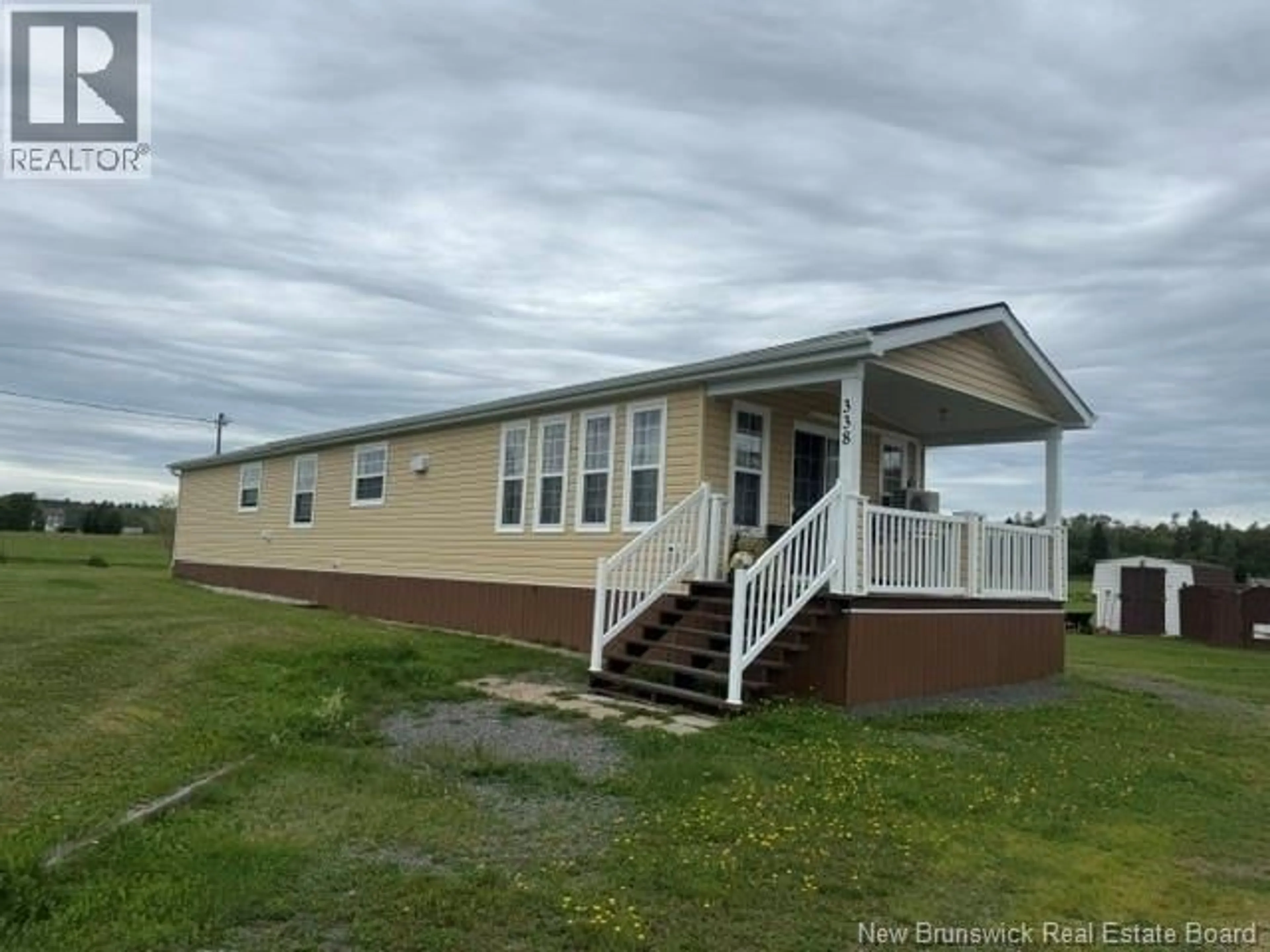 Home with vinyl exterior material, building for 338 JACQUET RIVER DRIVE, Belledune New Brunswick E8G2E9