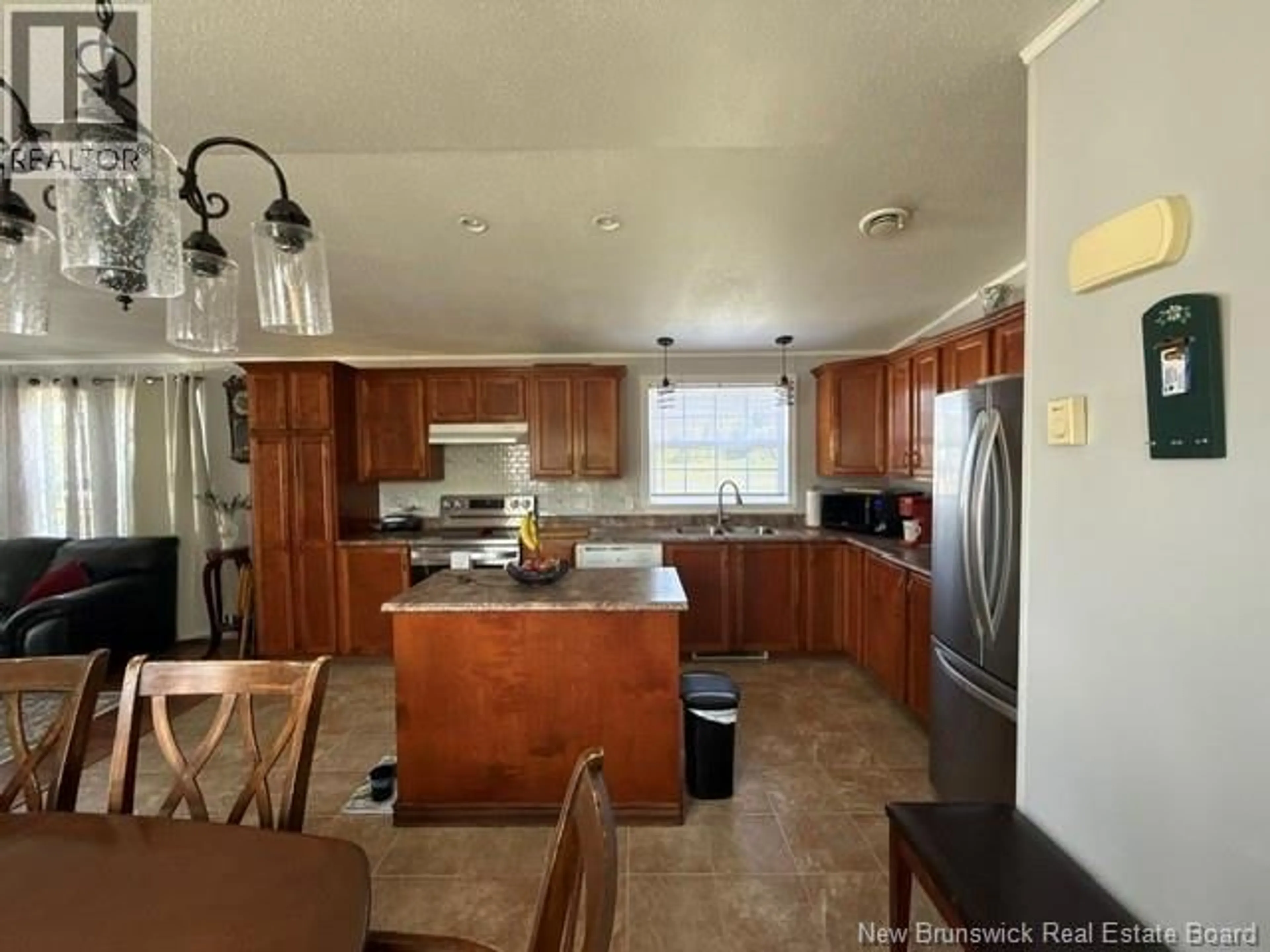 Open concept kitchen, unknown for 338 JACQUET RIVER DRIVE, Belledune New Brunswick E8G2E9