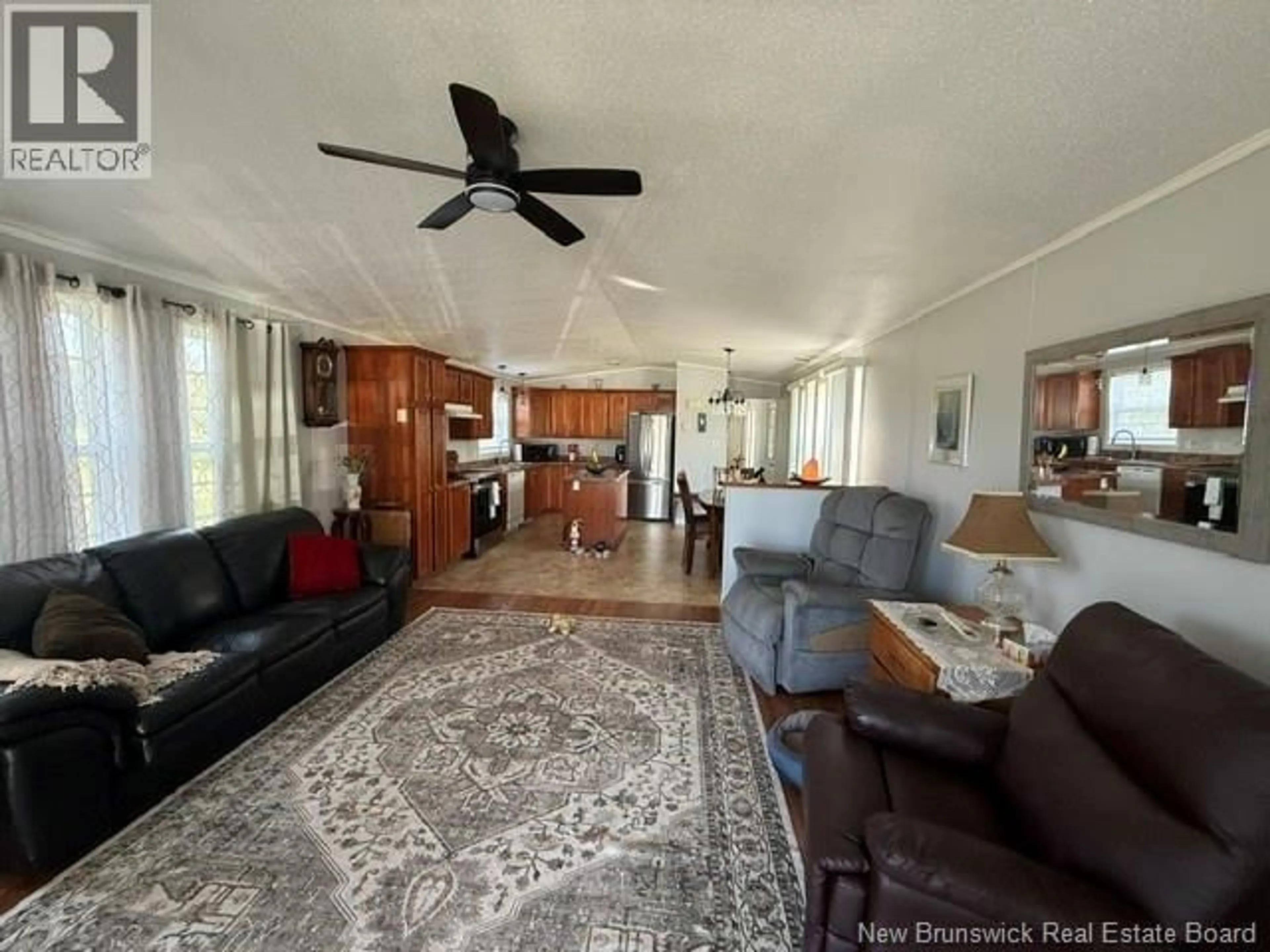 Living room with furniture, unknown for 338 JACQUET RIVER DRIVE, Belledune New Brunswick E8G2E9