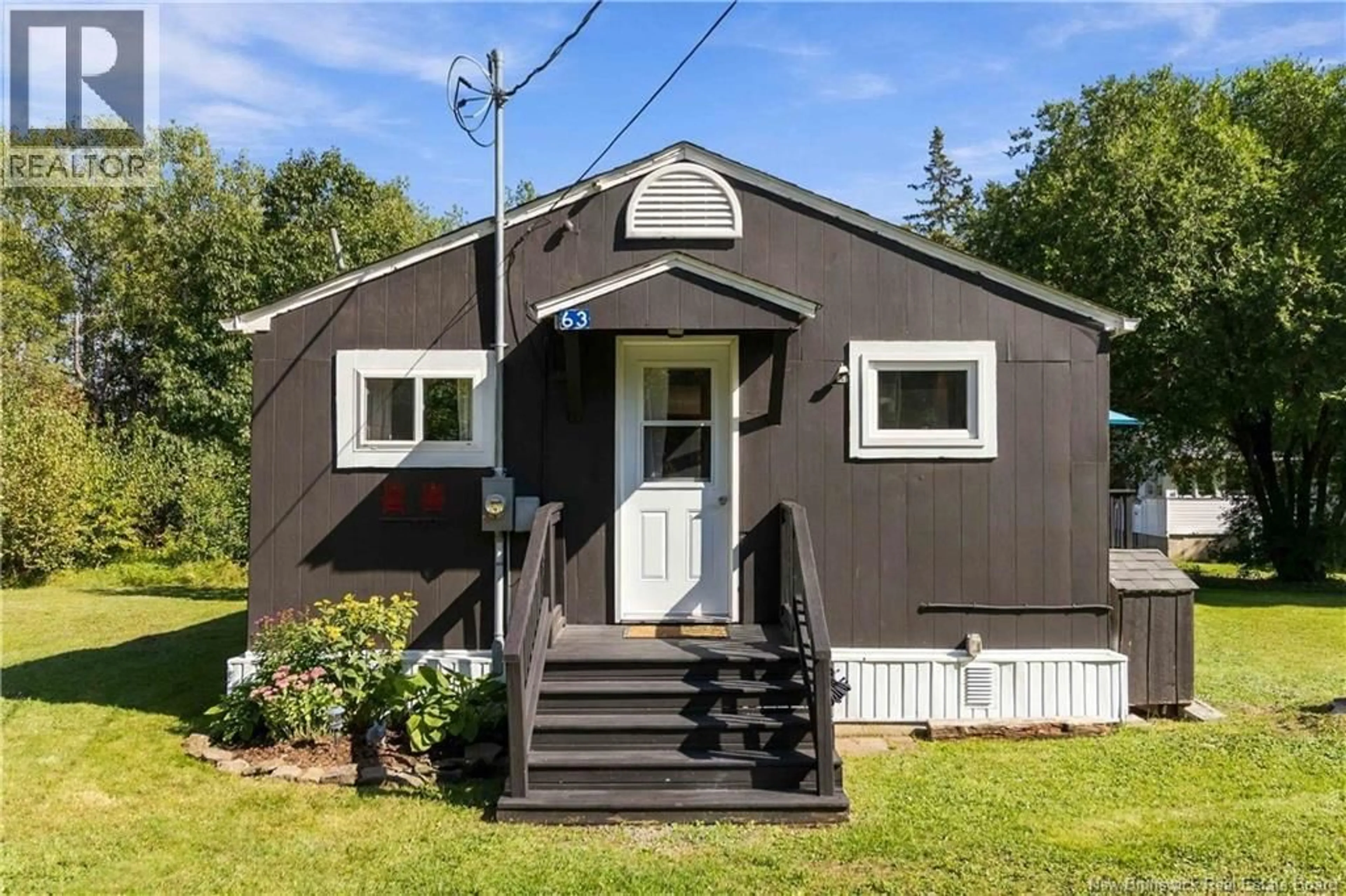 Home with vinyl exterior material, street for 63 COUNTRY ROAD, Shediac New Brunswick E4R2A9