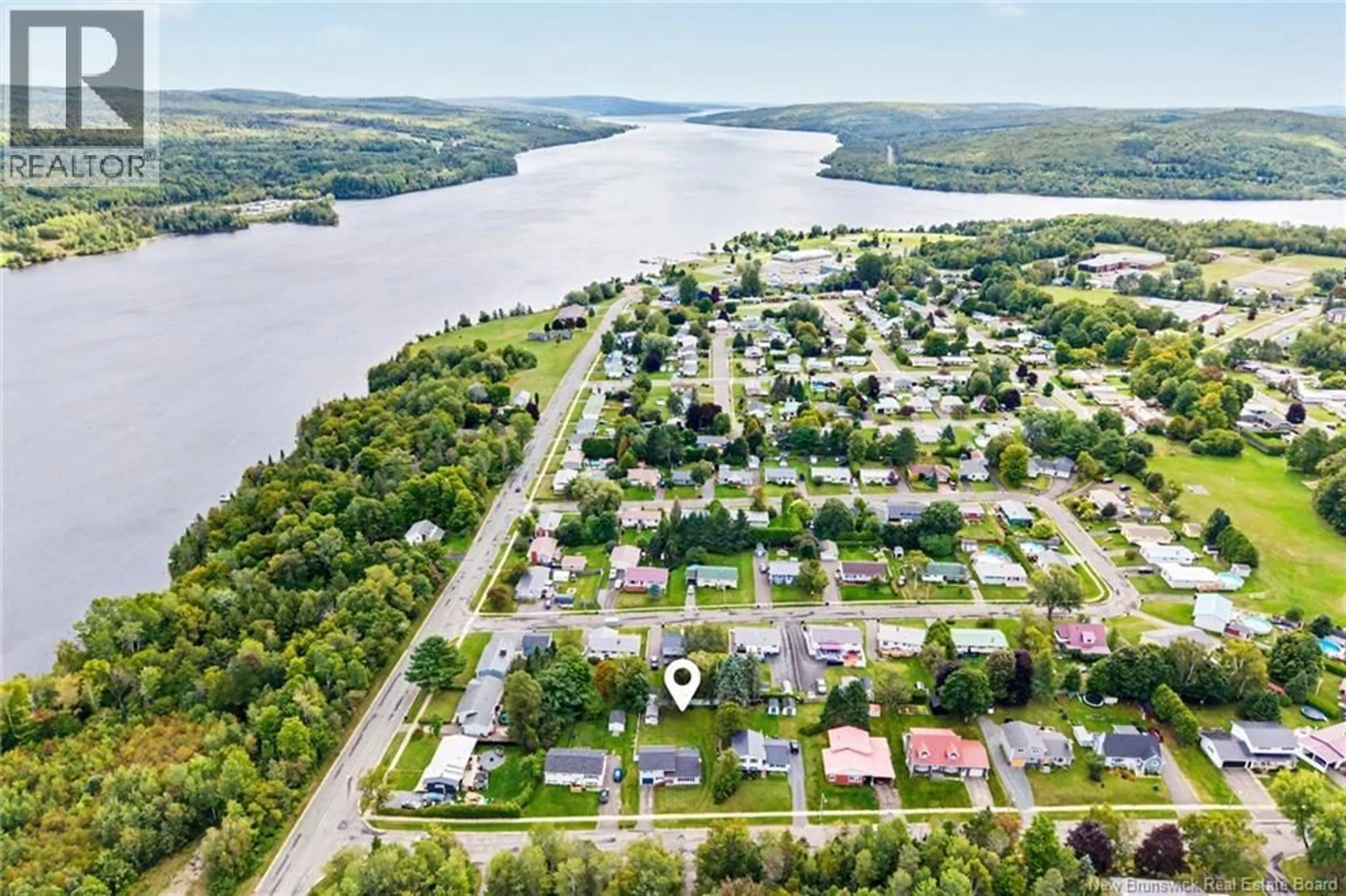 A pic from outside/outdoor area/front of a property/back of a property/a pic from drone, water/lake/river/ocean view for 12 MCNAIR DRIVE, Nackawic New Brunswick E6G1A7