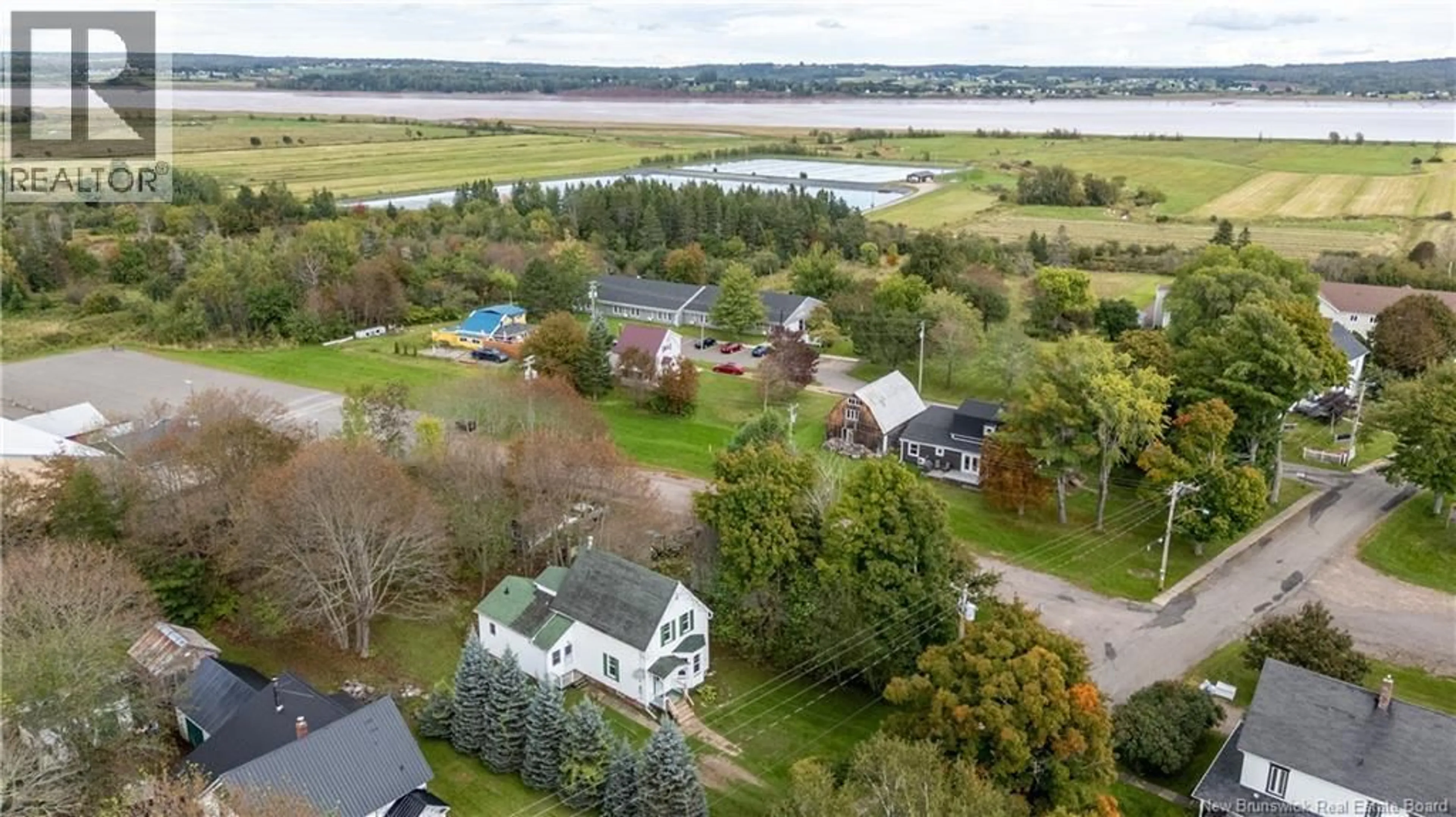 A pic from outside/outdoor area/front of a property/back of a property/a pic from drone, water/lake/river/ocean view for 24 MILL ST, Hillsborough New Brunswick E4H2Z8
