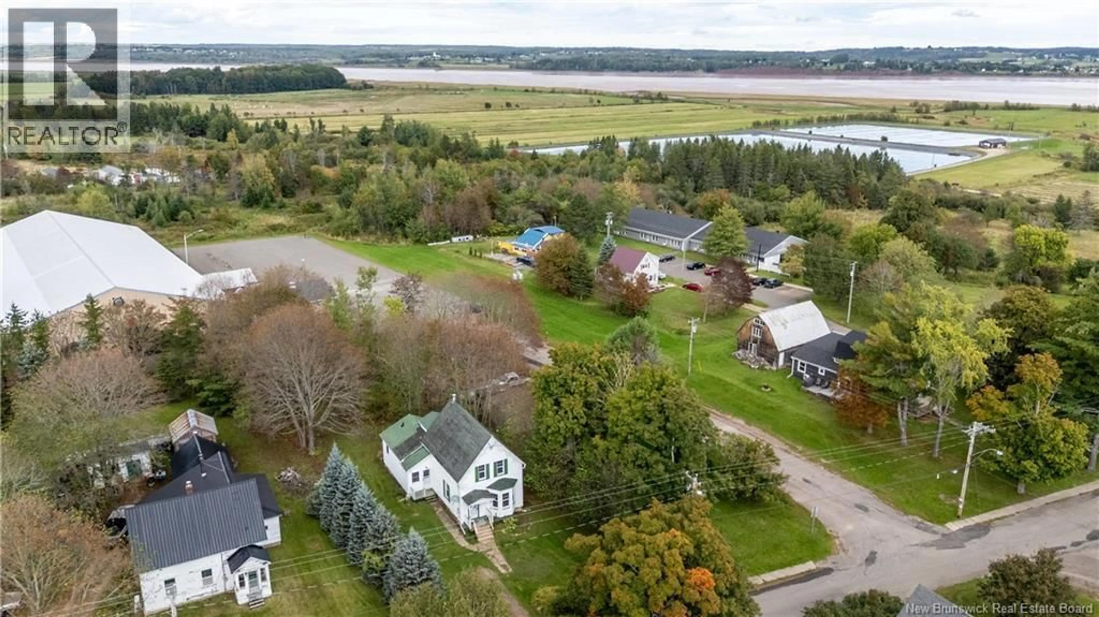 A pic from outside/outdoor area/front of a property/back of a property/a pic from drone, water/lake/river/ocean view for 24 MILL ST, Hillsborough New Brunswick E4H2Z8