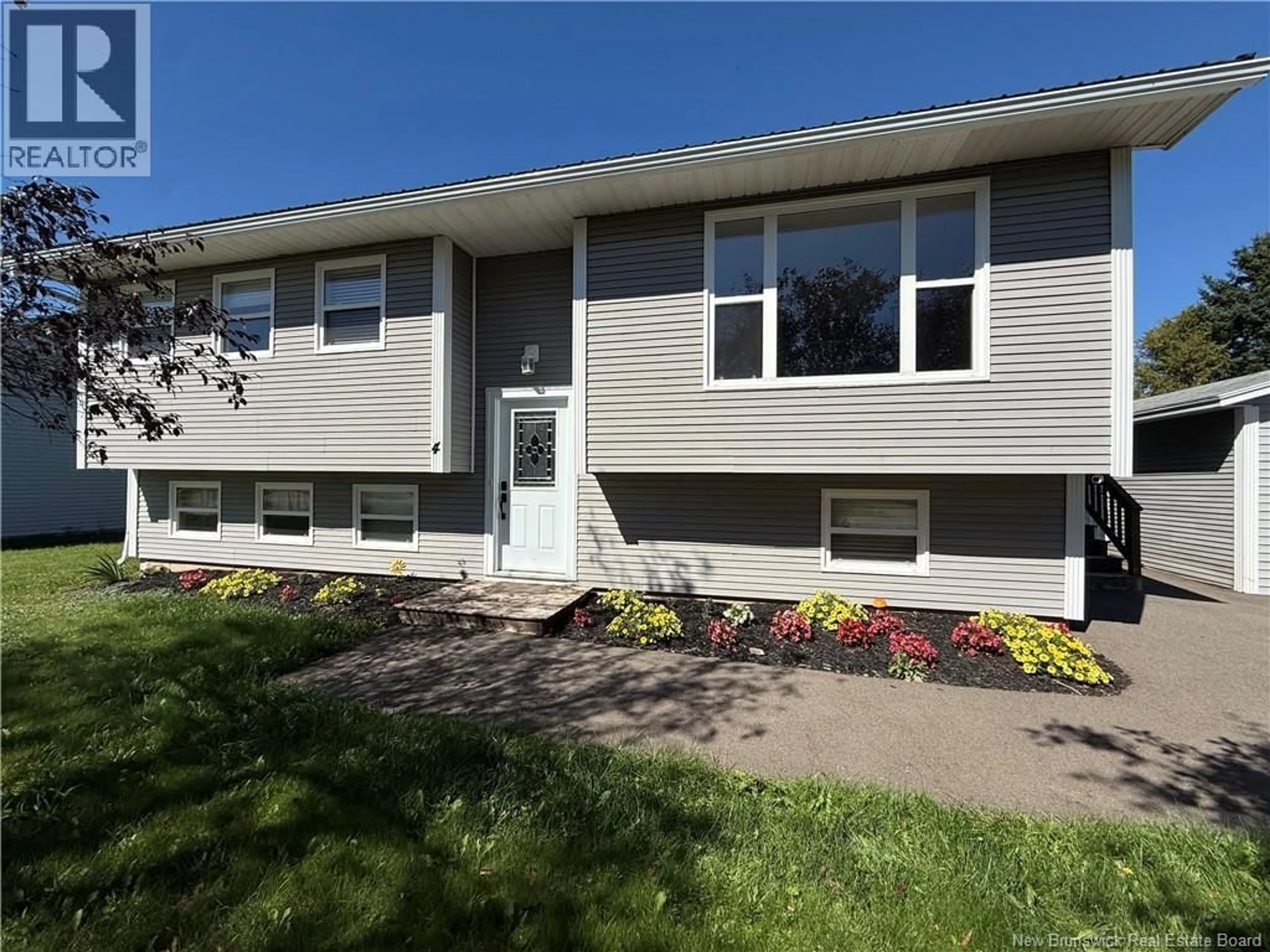 Home with vinyl exterior material, street for 4 PHILLIPS STREET, Sussex Corner New Brunswick E4E3B8