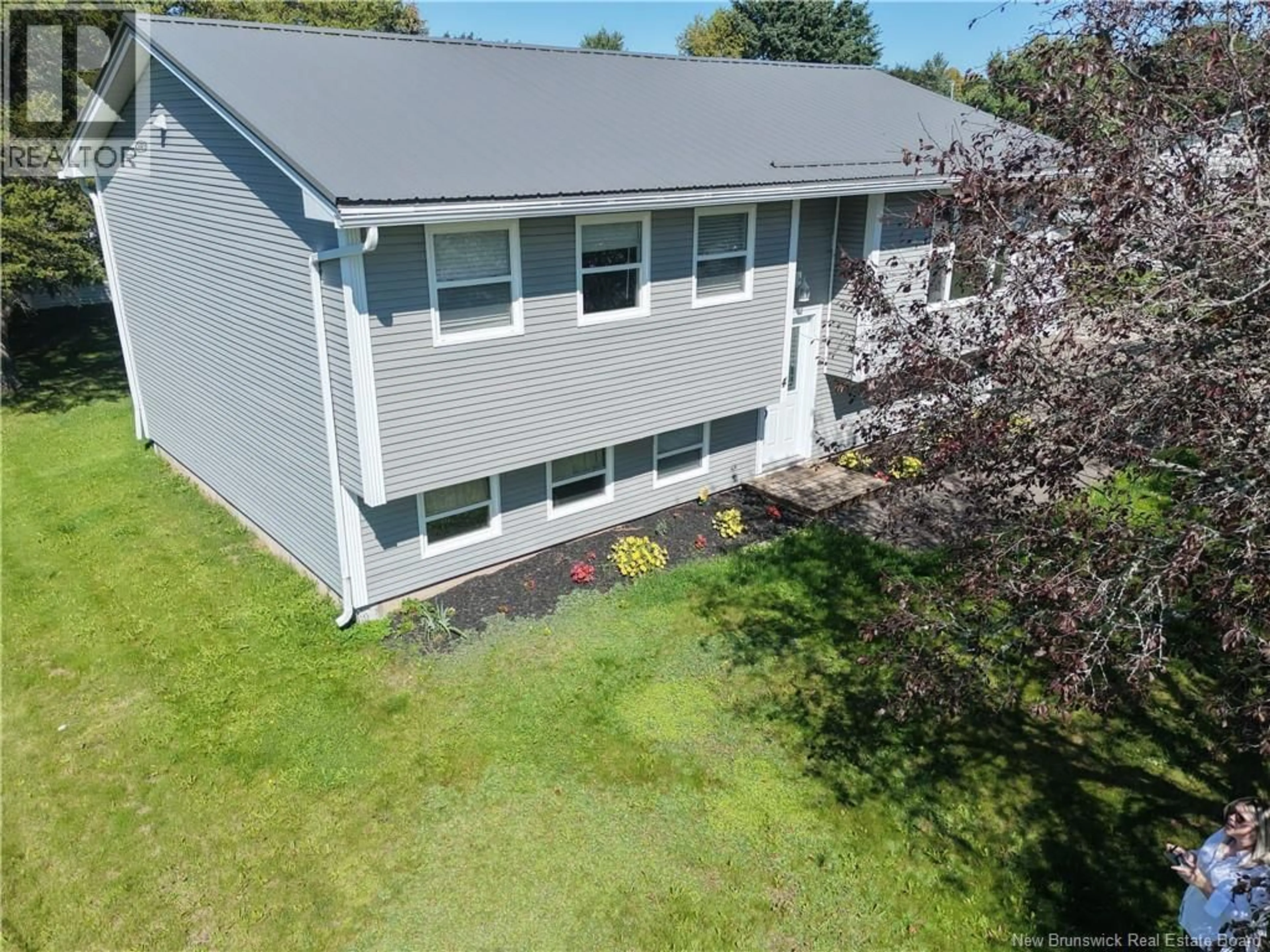 A pic from outside/outdoor area/front of a property/back of a property/a pic from drone, unknown for 4 PHILLIPS STREET, Sussex Corner New Brunswick E4E3B8
