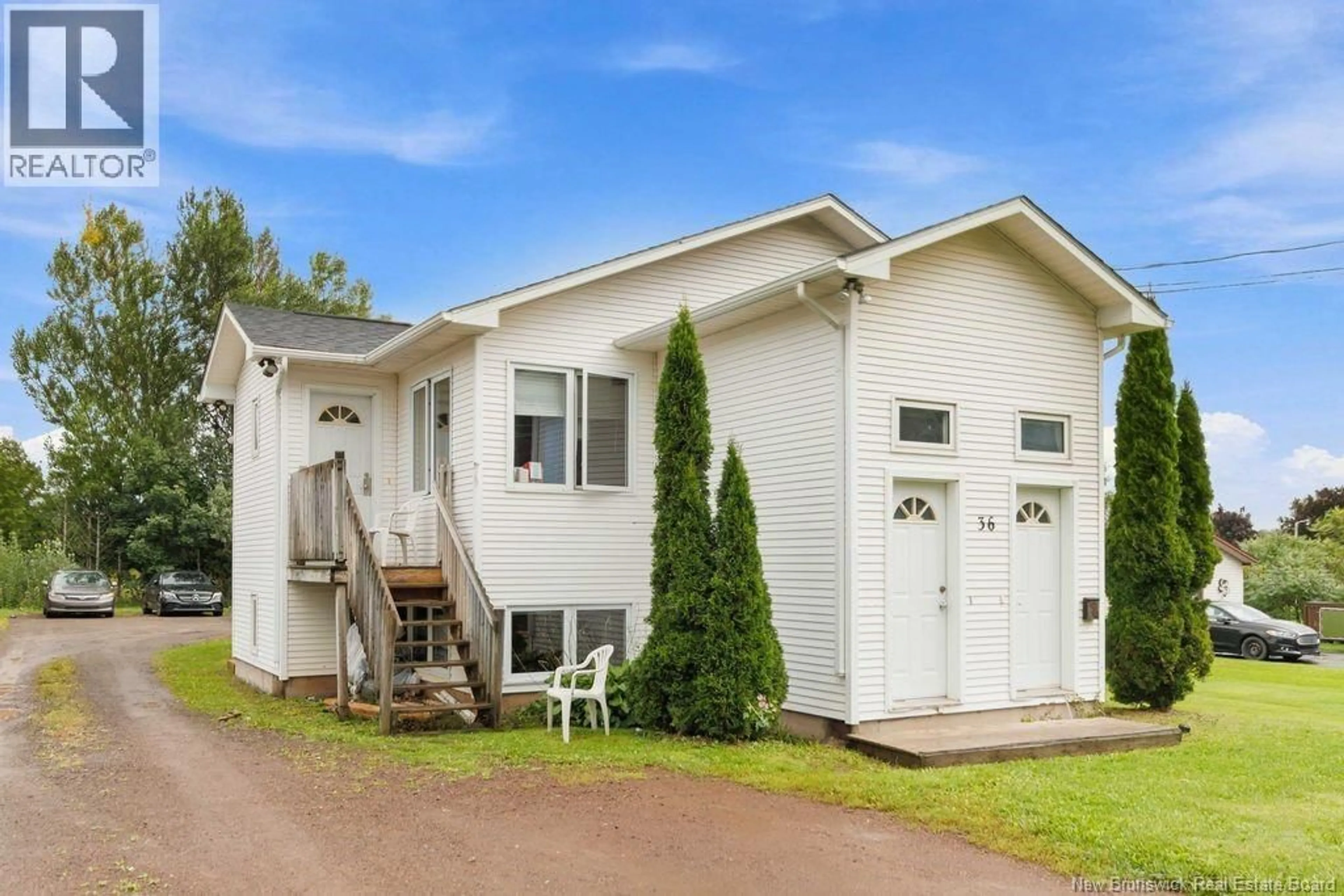 Home with vinyl exterior material, street for 36 LORETTE STREET, Dieppe New Brunswick E1A2E9