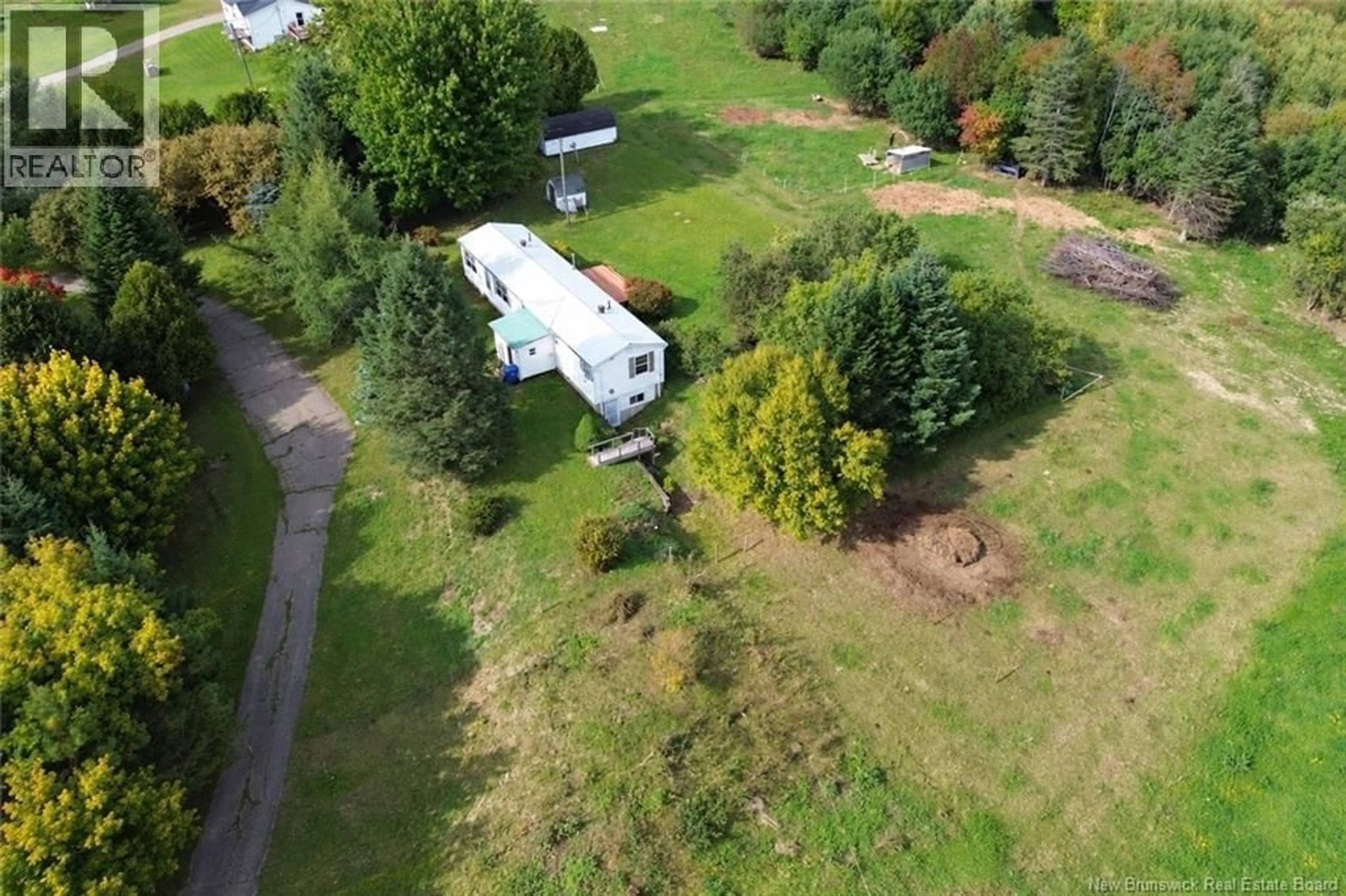 A pic from outside/outdoor area/front of a property/back of a property/a pic from drone, unknown for 133 SMITH ROAD, Hartley Settlement New Brunswick E7K2X2