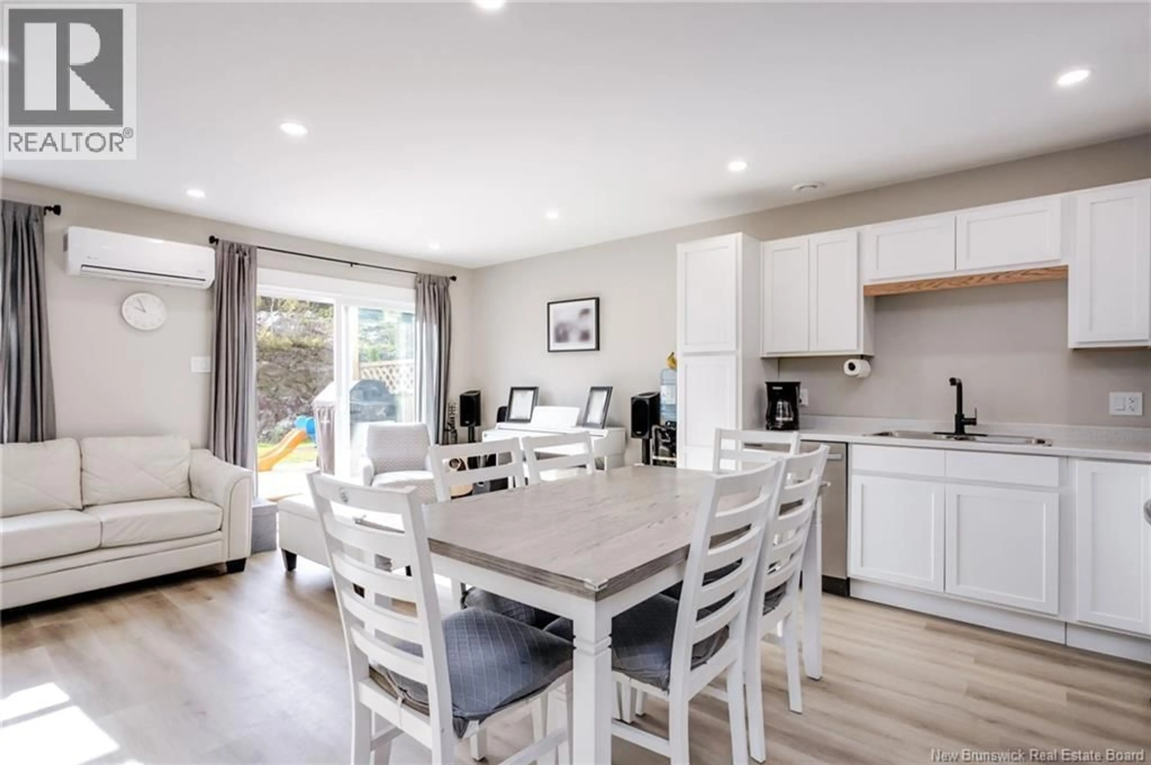 Open concept kitchen, wood/laminate floor for 143 ARLINGTON CRESCENT, Saint John New Brunswick E2K0G4