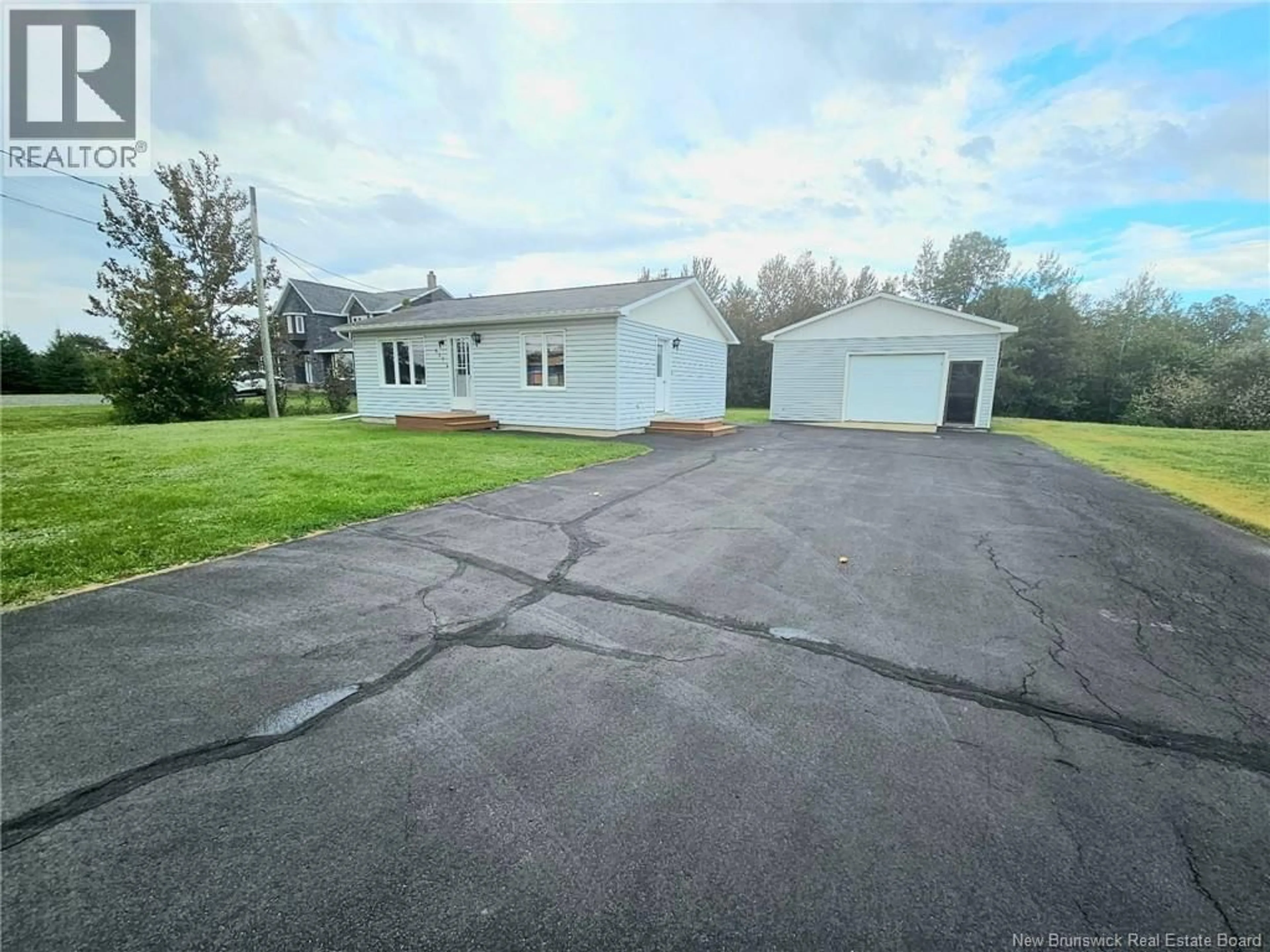 A pic from outside/outdoor area/front of a property/back of a property/a pic from drone, unknown for 611 PRINCIPALE, Beresford New Brunswick E8K1X6