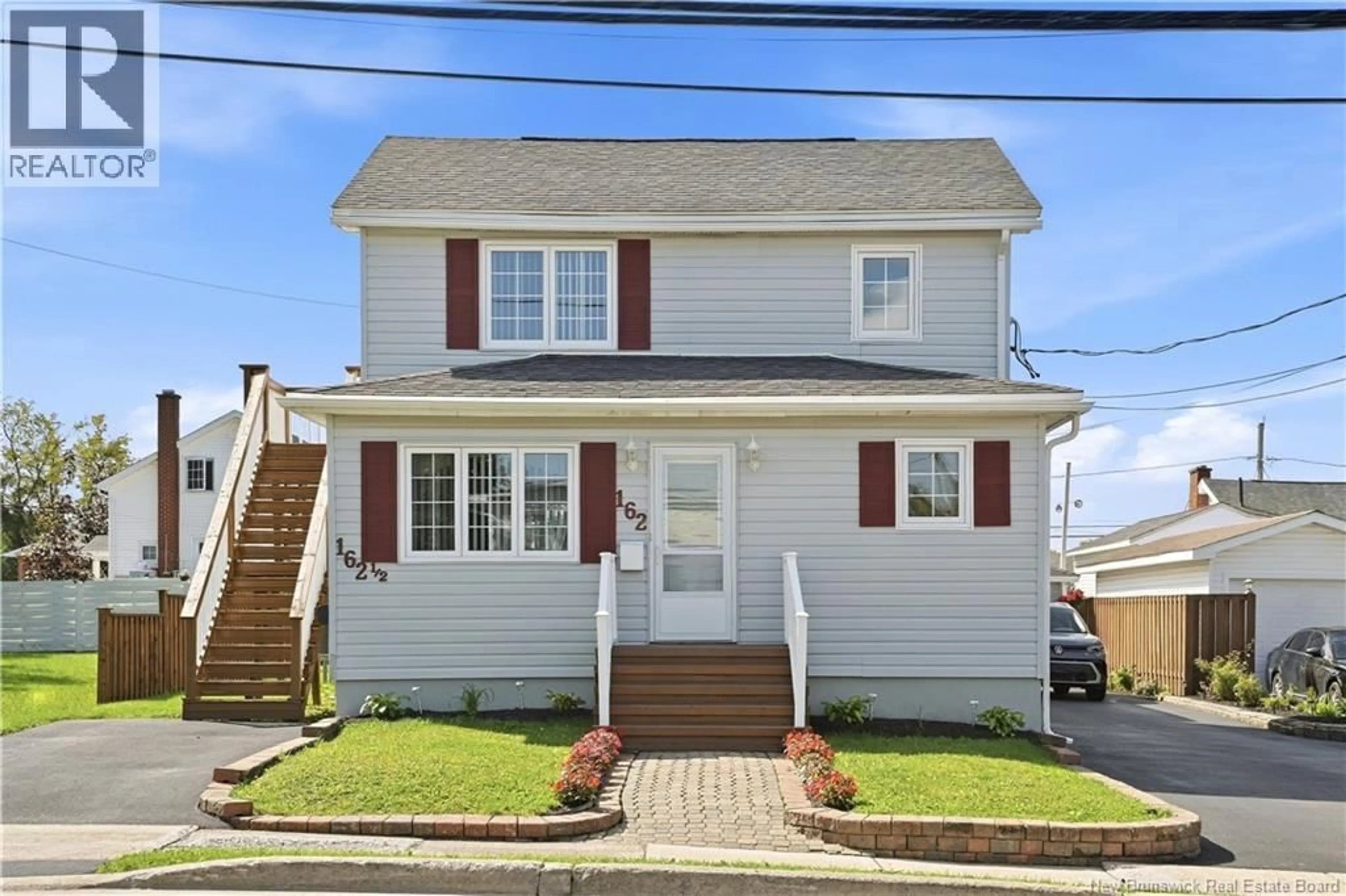 Home with vinyl exterior material, street for 162 CHURCHILL, Moncton New Brunswick E1G7J4