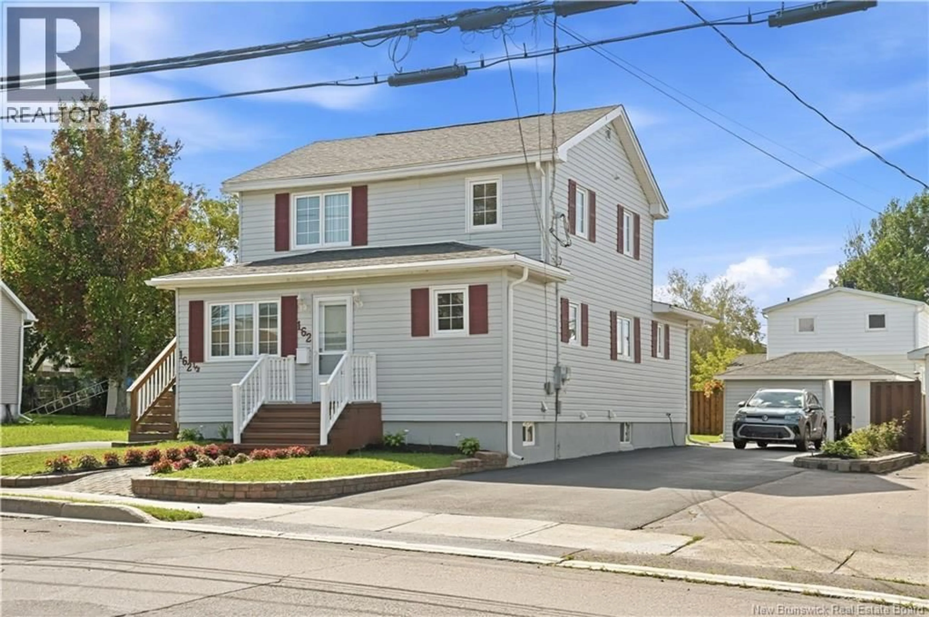 Home with vinyl exterior material, street for 162 CHURCHILL, Moncton New Brunswick E1G7J4
