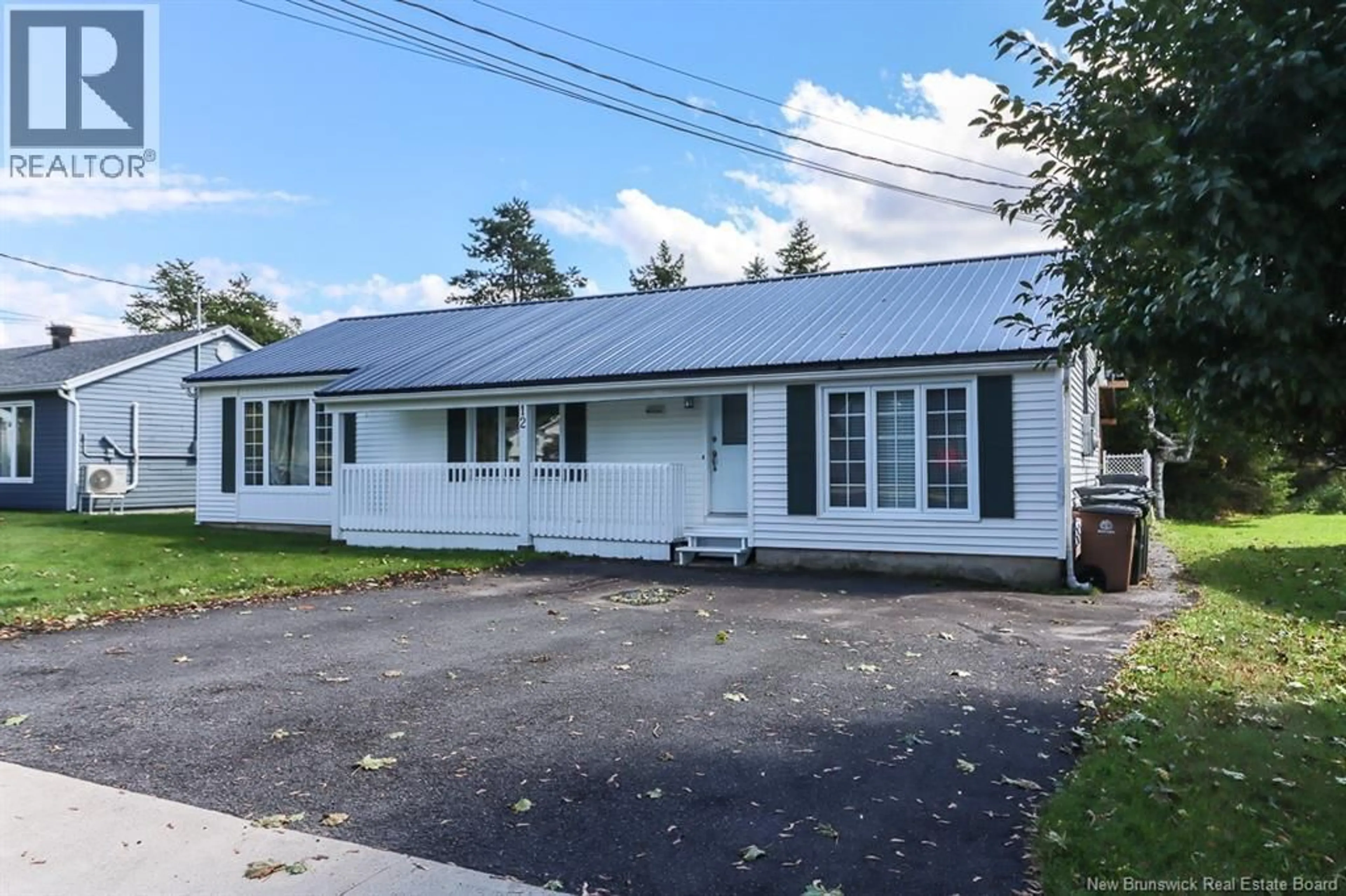 Home with vinyl exterior material, street for 12 REED STREET, Saint John New Brunswick E2K2A2