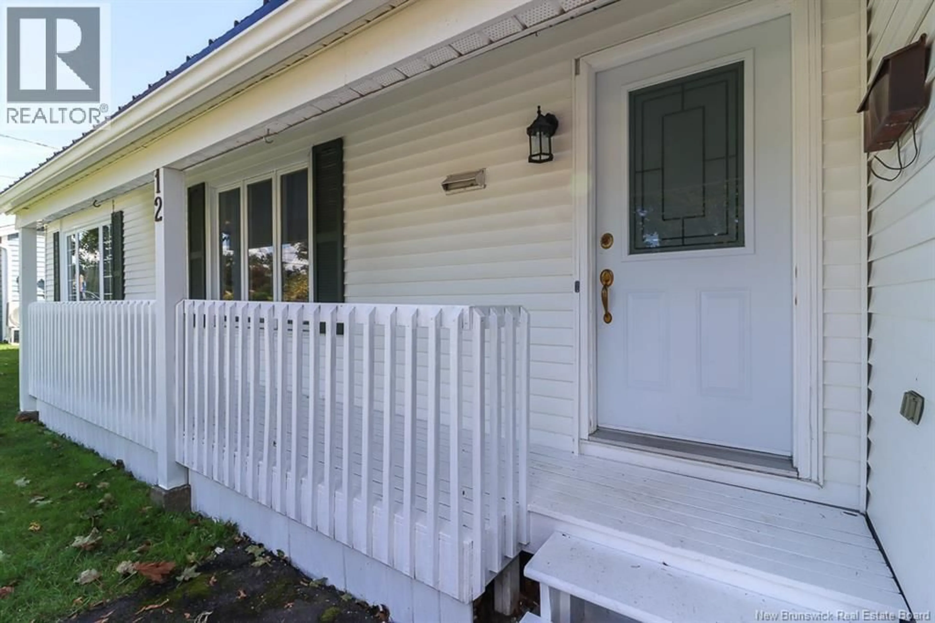 Home with vinyl exterior material, street for 12 REED STREET, Saint John New Brunswick E2K2A2
