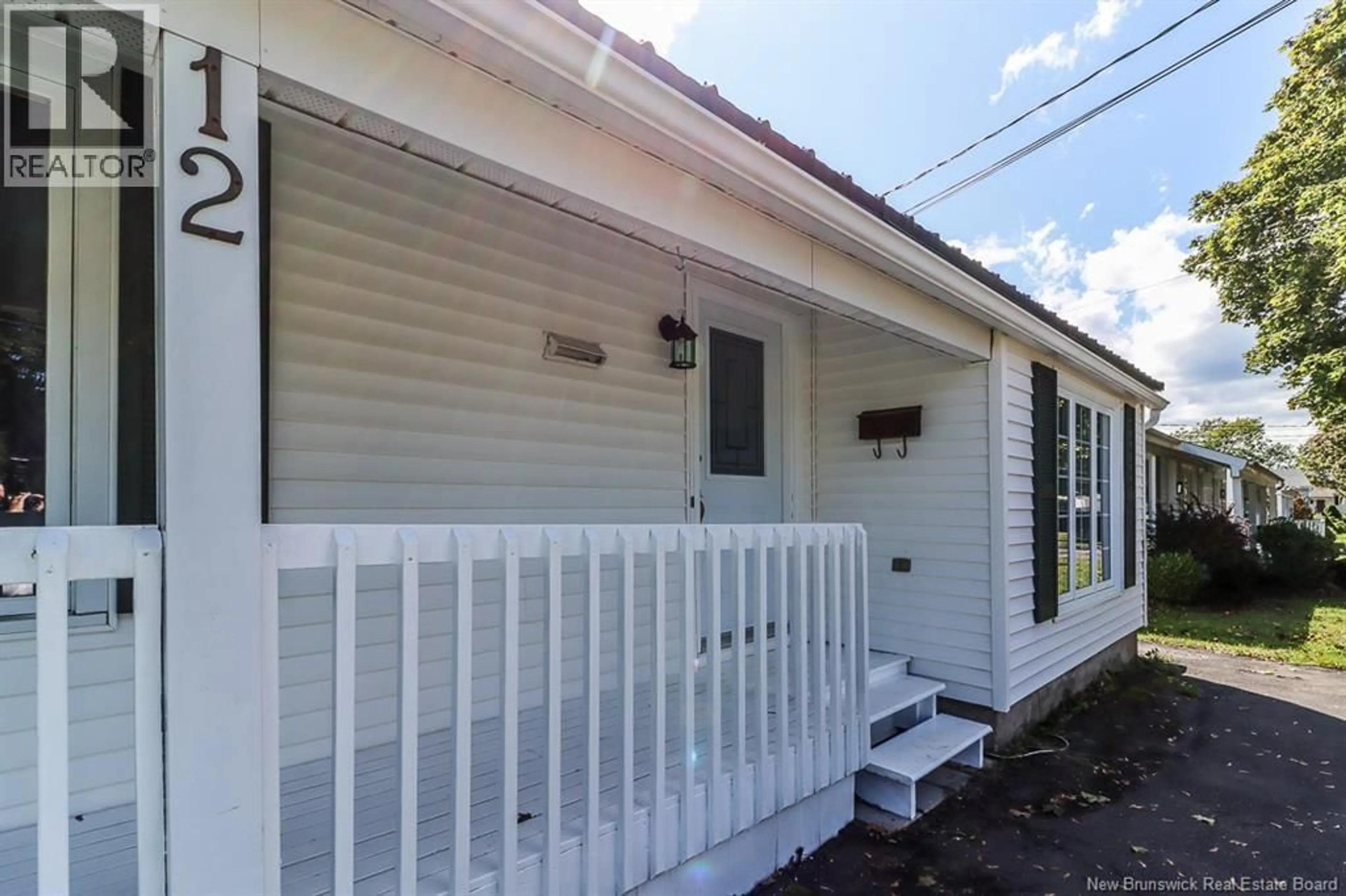 Home with vinyl exterior material, street for 12 REED STREET, Saint John New Brunswick E2K2A2