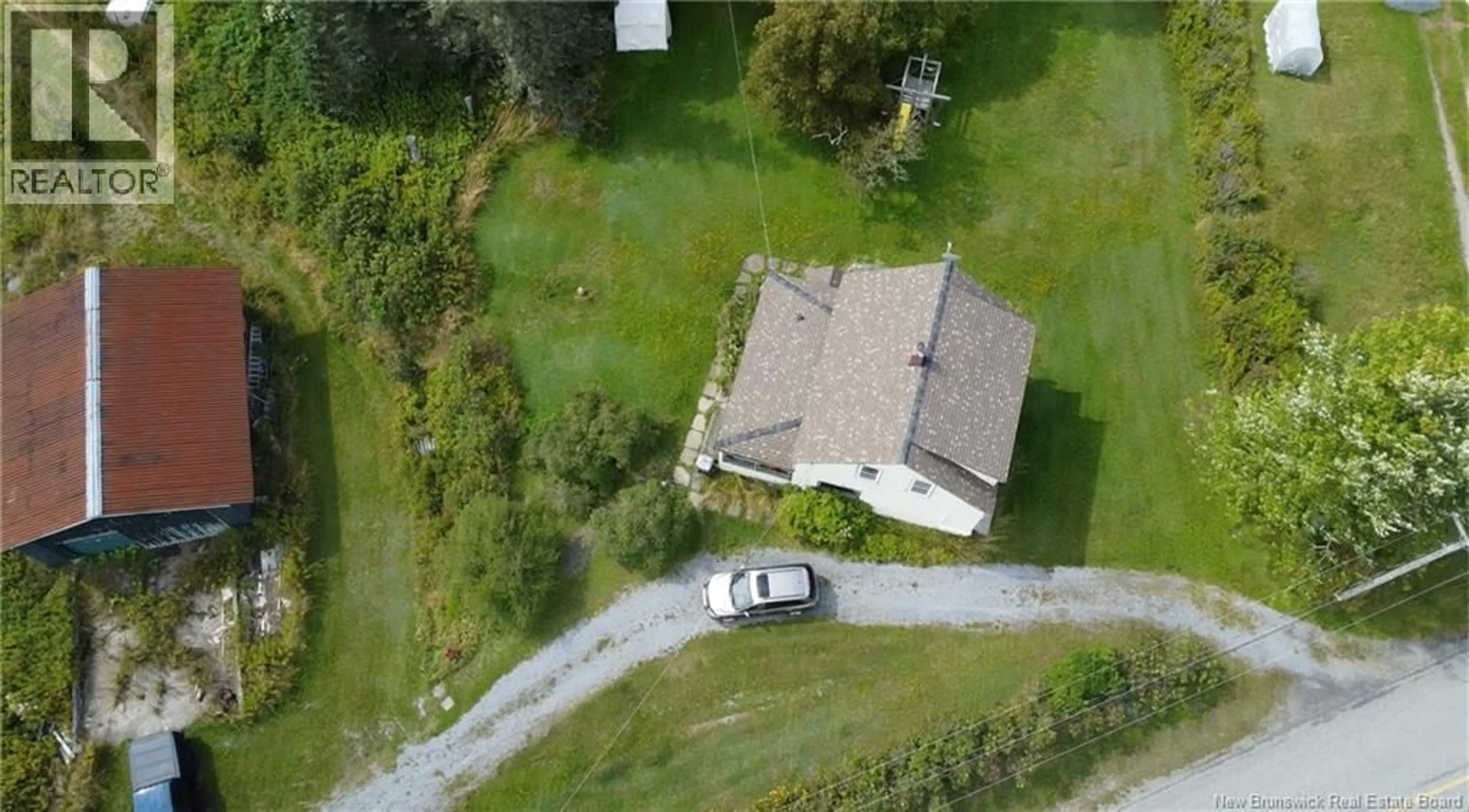 A pic from outside/outdoor area/front of a property/back of a property/a pic from drone, street for 3316 RED HEAD ROAD, Mispec New Brunswick E2J4W9