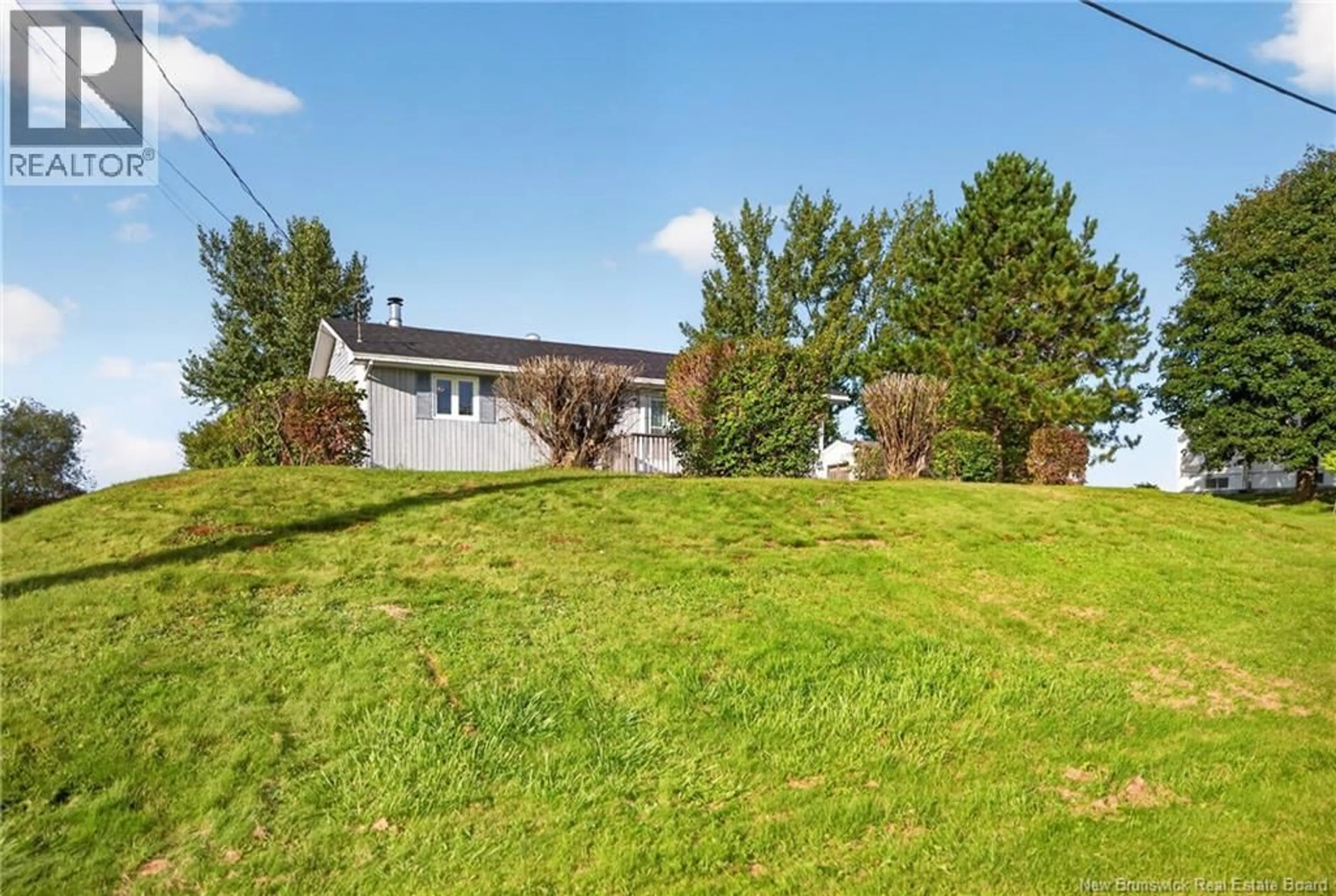 A pic from outside/outdoor area/front of a property/back of a property/a pic from drone, street for 240 SMITH COURT, Big River New Brunswick E2A6S6