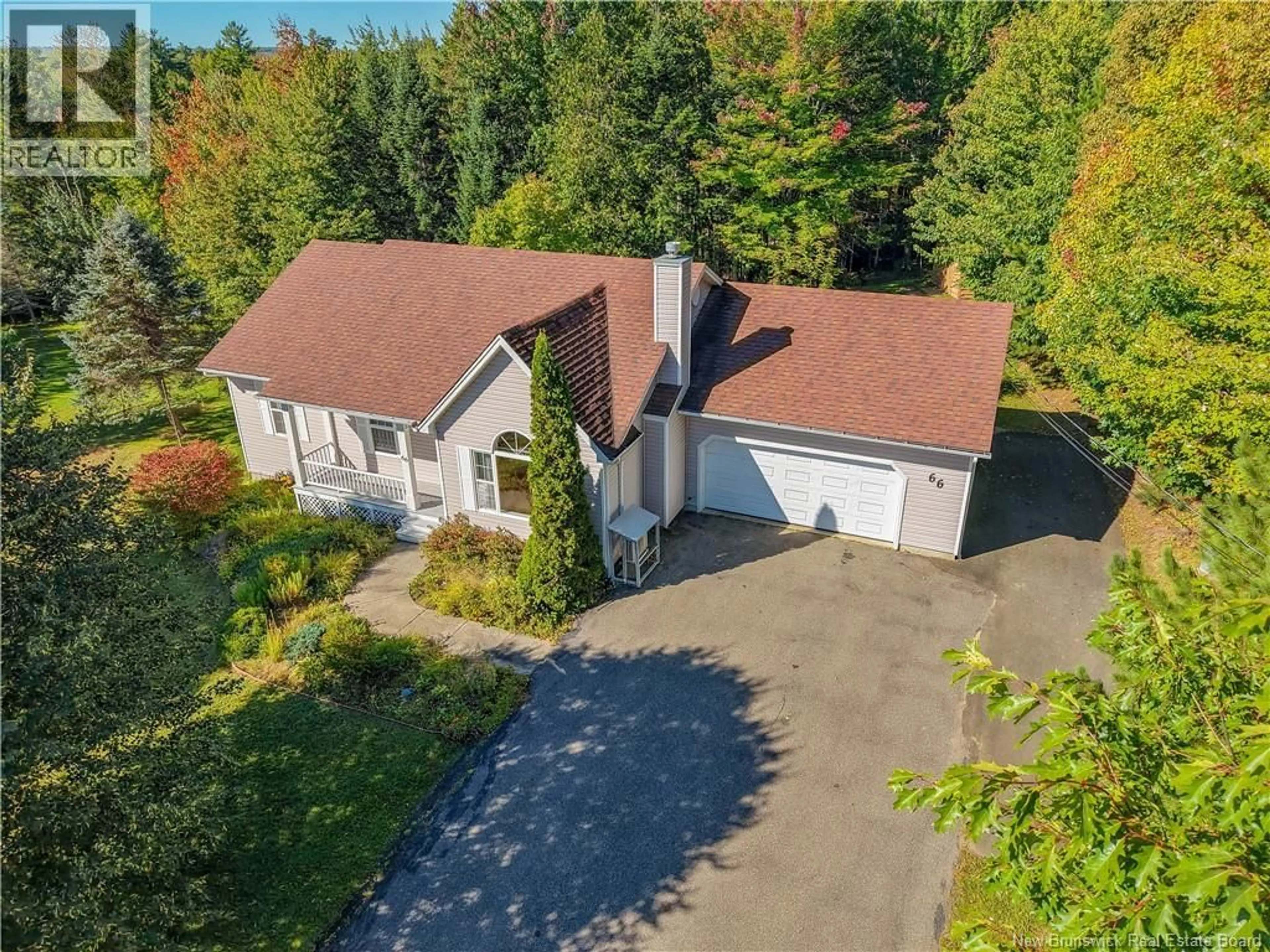 A pic from outside/outdoor area/front of a property/back of a property/a pic from drone, street for 66 TAURUS DRIVE, Hanwell New Brunswick E3C1N1