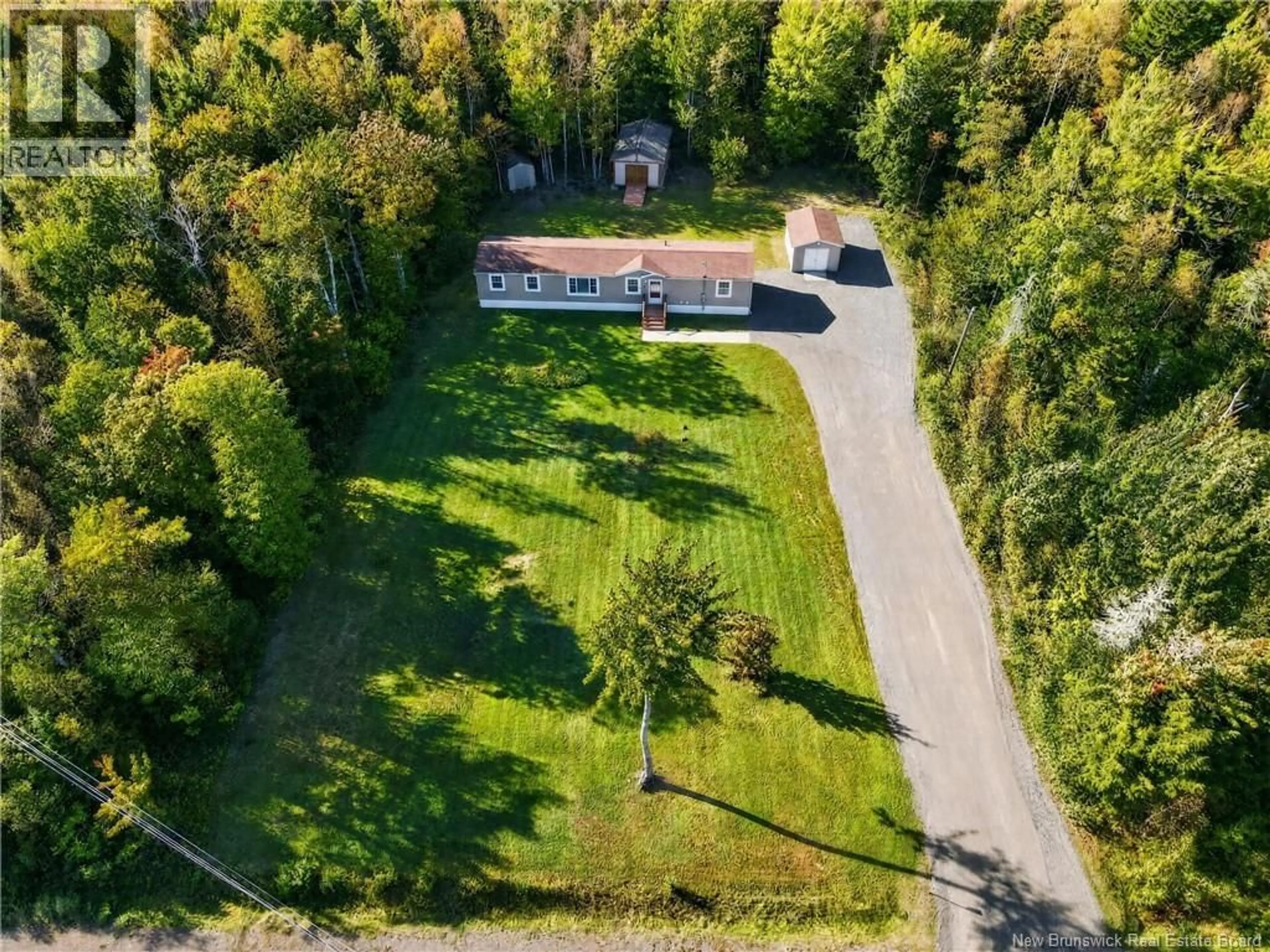A pic from outside/outdoor area/front of a property/back of a property/a pic from drone, street for 2968 ROUTE 115, Irishtown New Brunswick E1H3K4