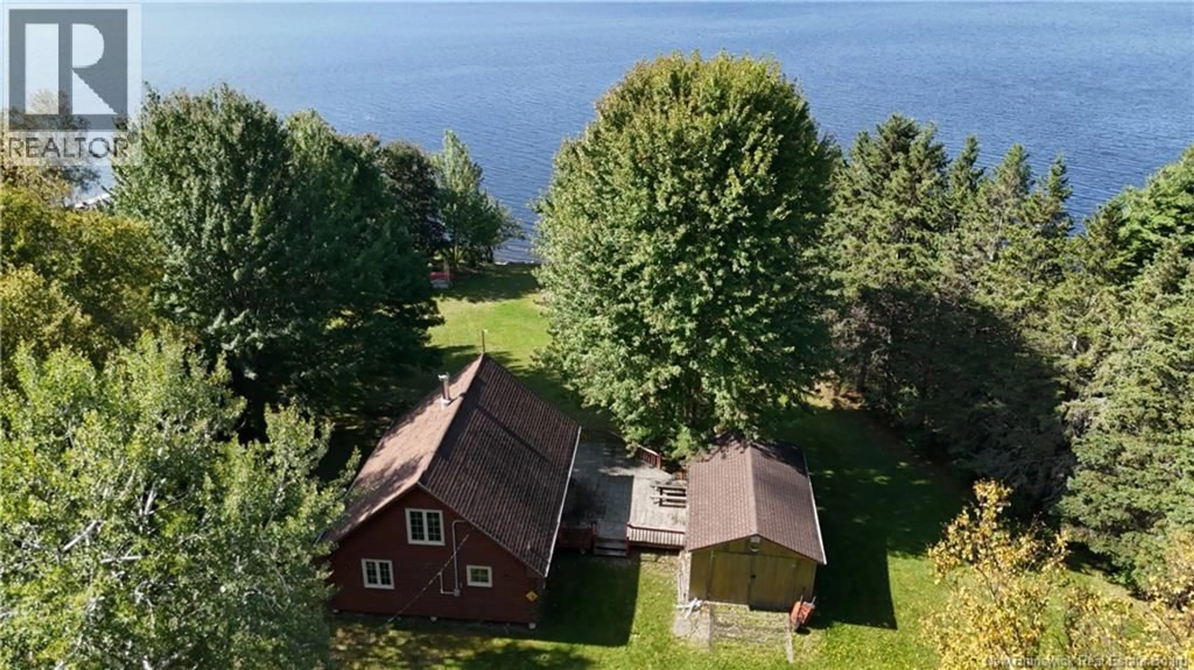 A pic from outside/outdoor area/front of a property/back of a property/a pic from drone, water/lake/river/ocean view for 3073 ROUTE 105, Bear Island New Brunswick E6L2X2