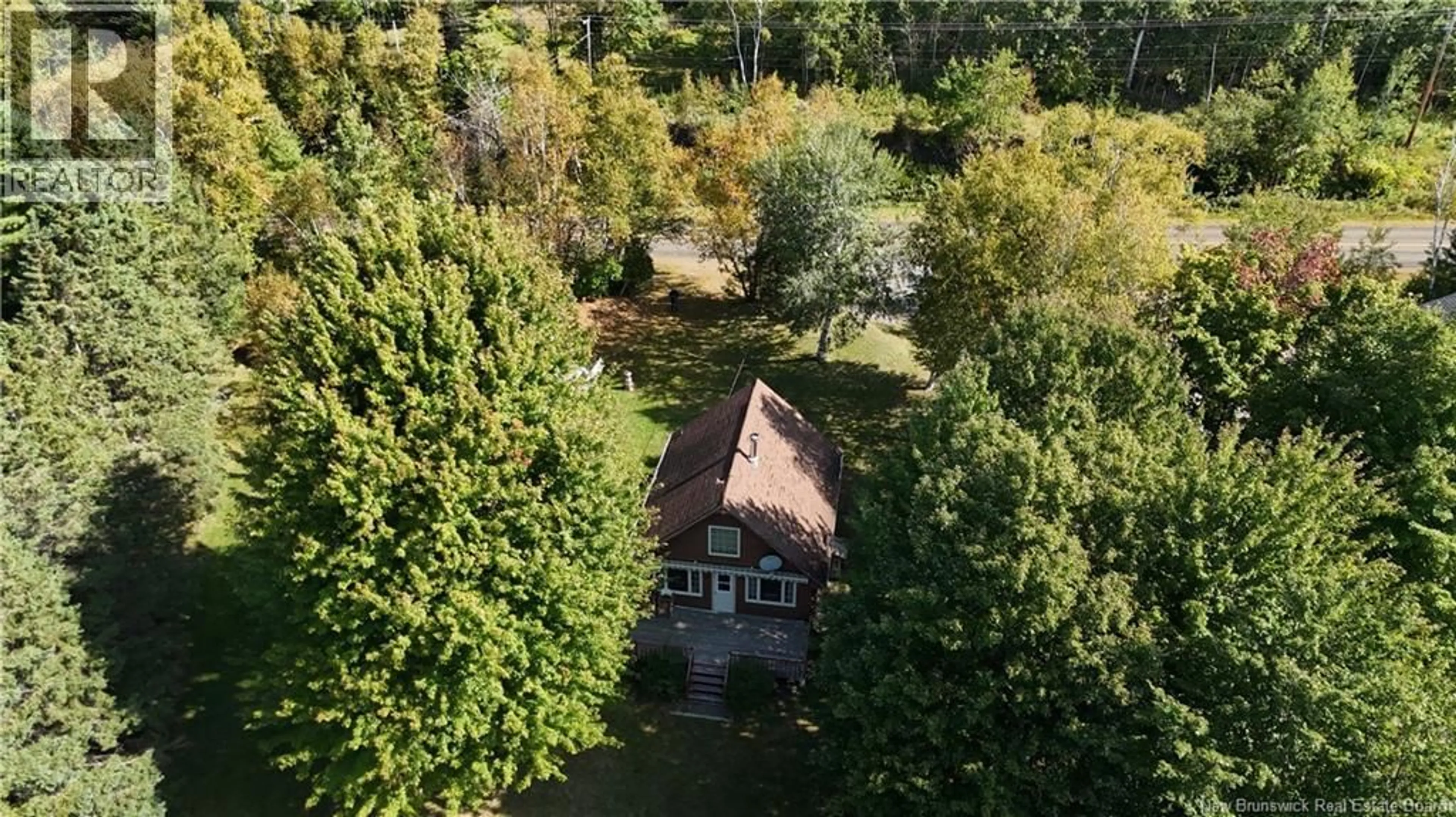 A pic from outside/outdoor area/front of a property/back of a property/a pic from drone, forest/trees view for 3073 ROUTE 105, Bear Island New Brunswick E6L2X2