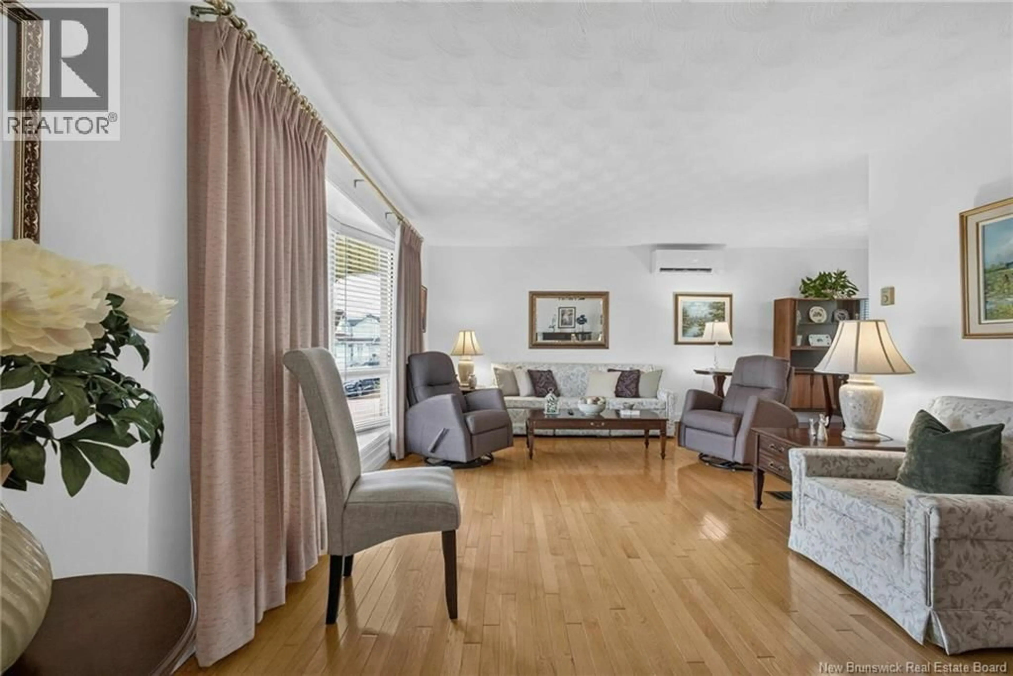 Living room with furniture, wood/laminate floor for 54 OHIO ROAD, Shediac New Brunswick E4P2J9