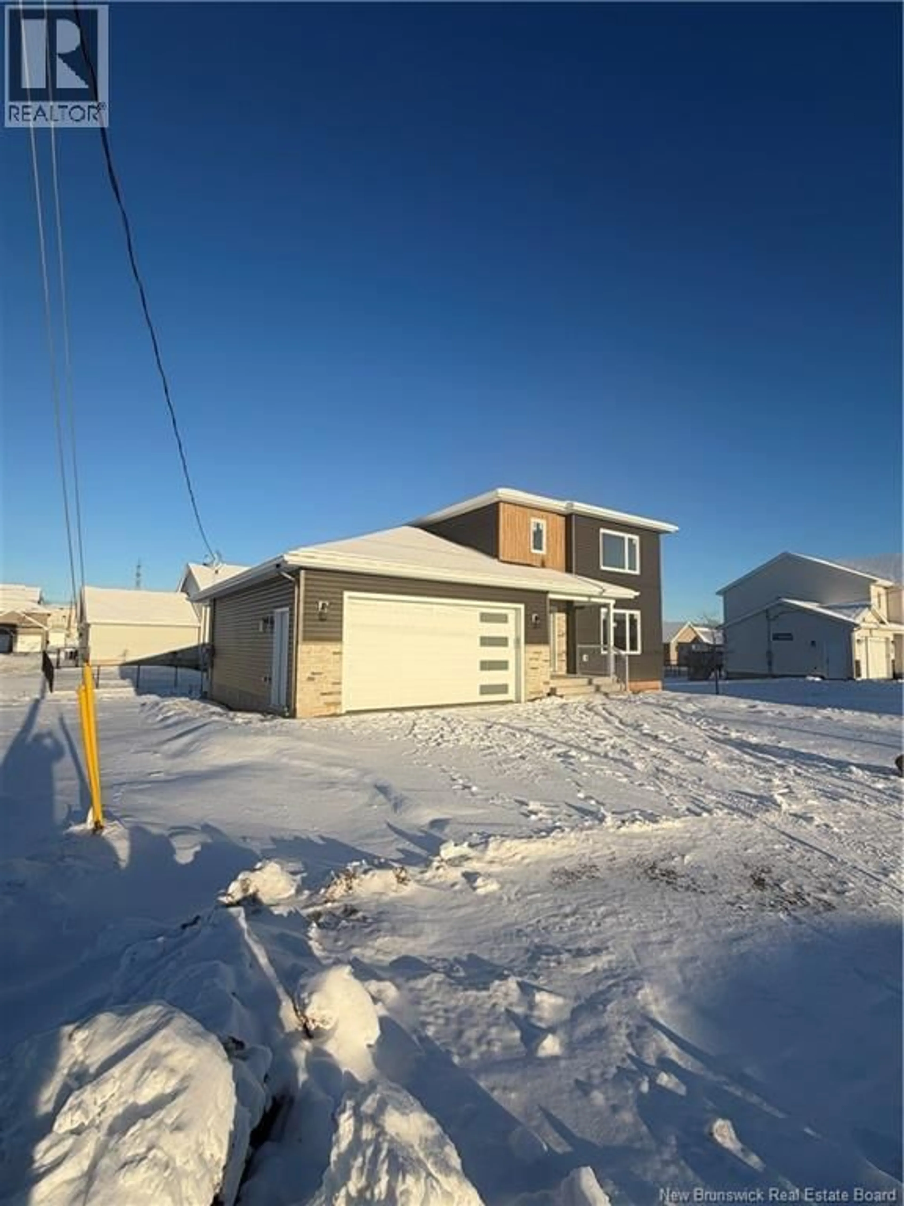 A pic from outside/outdoor area/front of a property/back of a property/a pic from drone, street for 90 MELBOURNE CRESCENT, Moncton New Brunswick E1E0K5