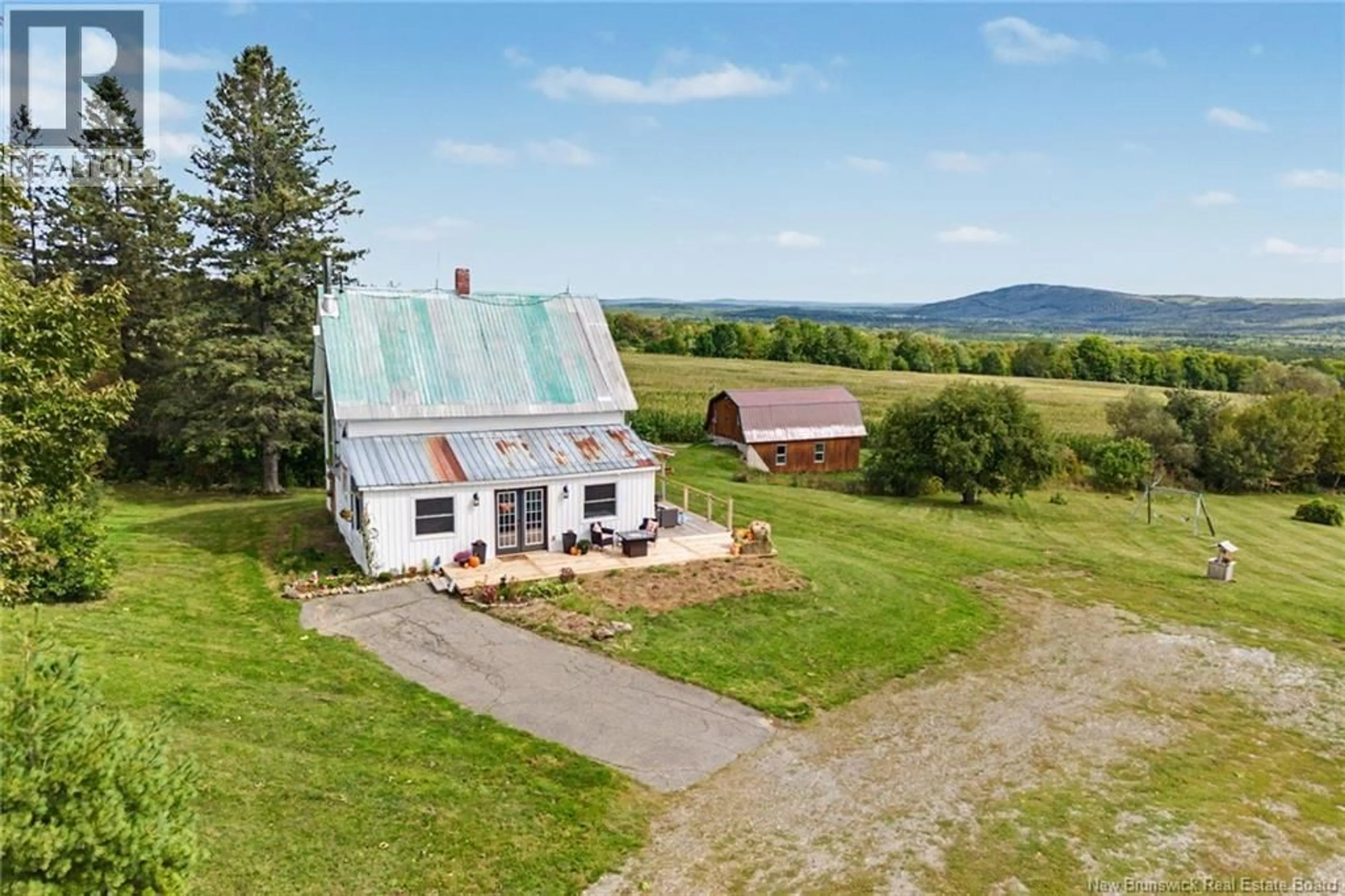 A pic from outside/outdoor area/front of a property/back of a property/a pic from drone, mountain view for 1172 ROUTE 605, Maple Ridge New Brunswick E9C1C9