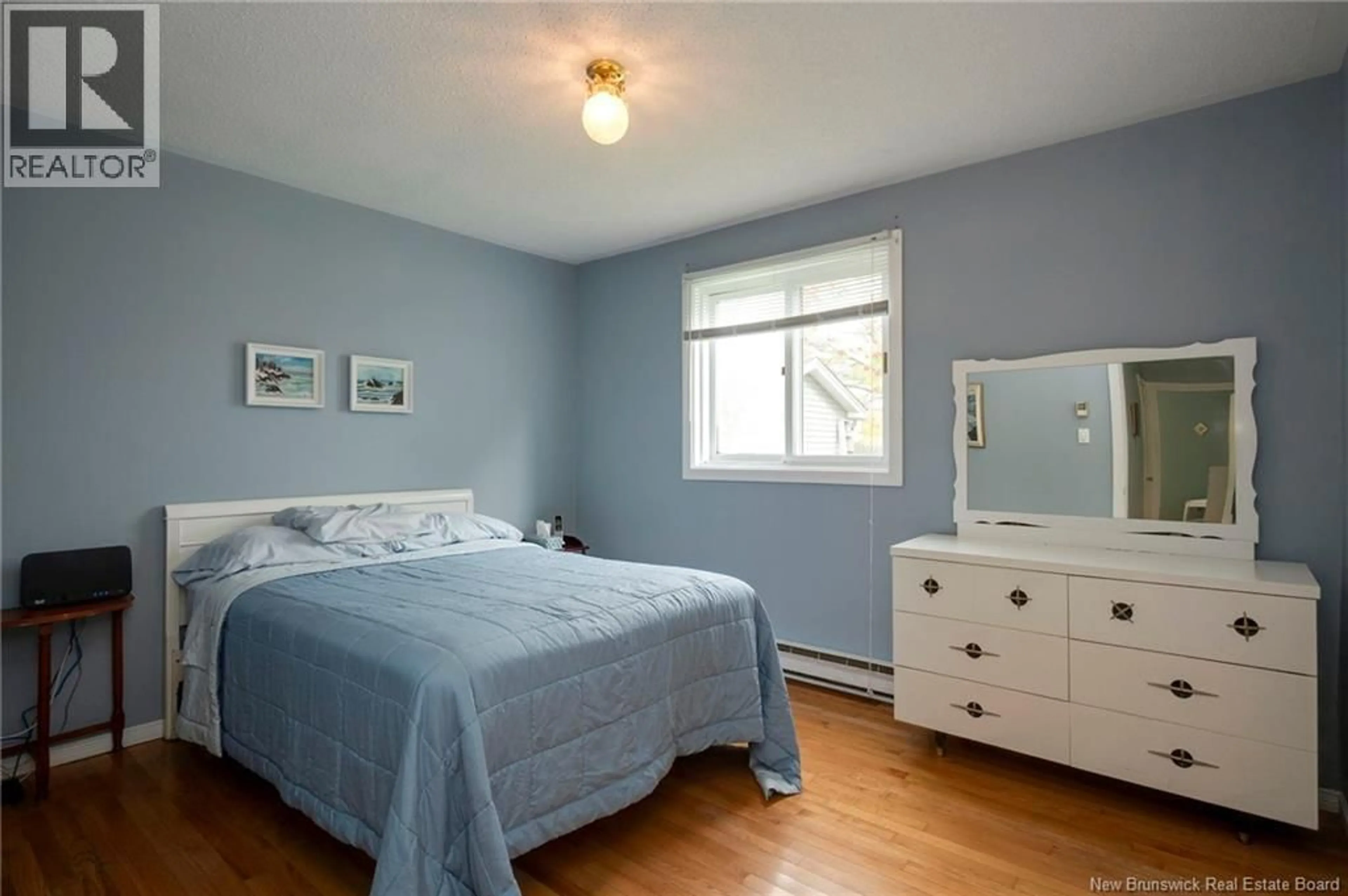 Bedroom with bed, wood/laminate floor for 18 ST.ANNE STREET, Saint John New Brunswick E2J2N9