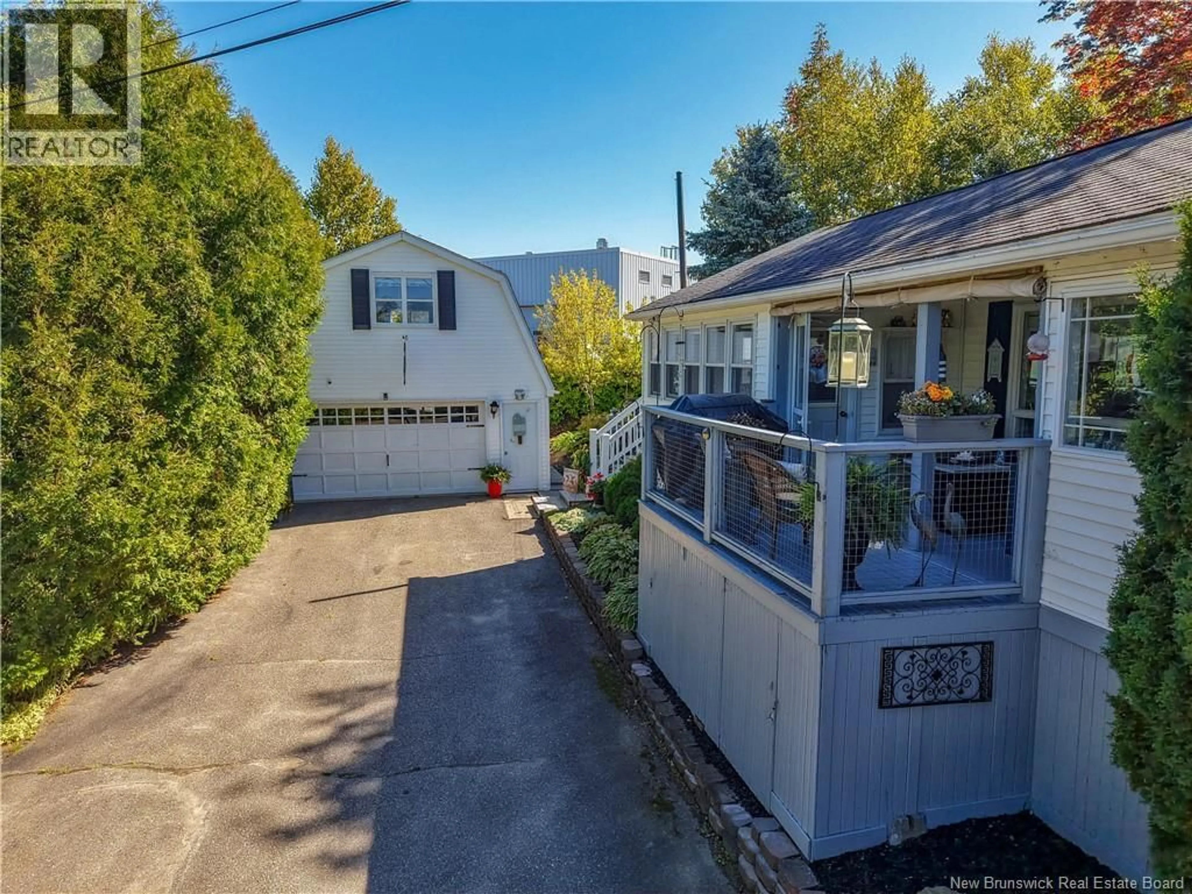 A pic from outside/outdoor area/front of a property/back of a property/a pic from drone, street for 636 BARCLAY LOOP, Fredericton New Brunswick E3B7L8