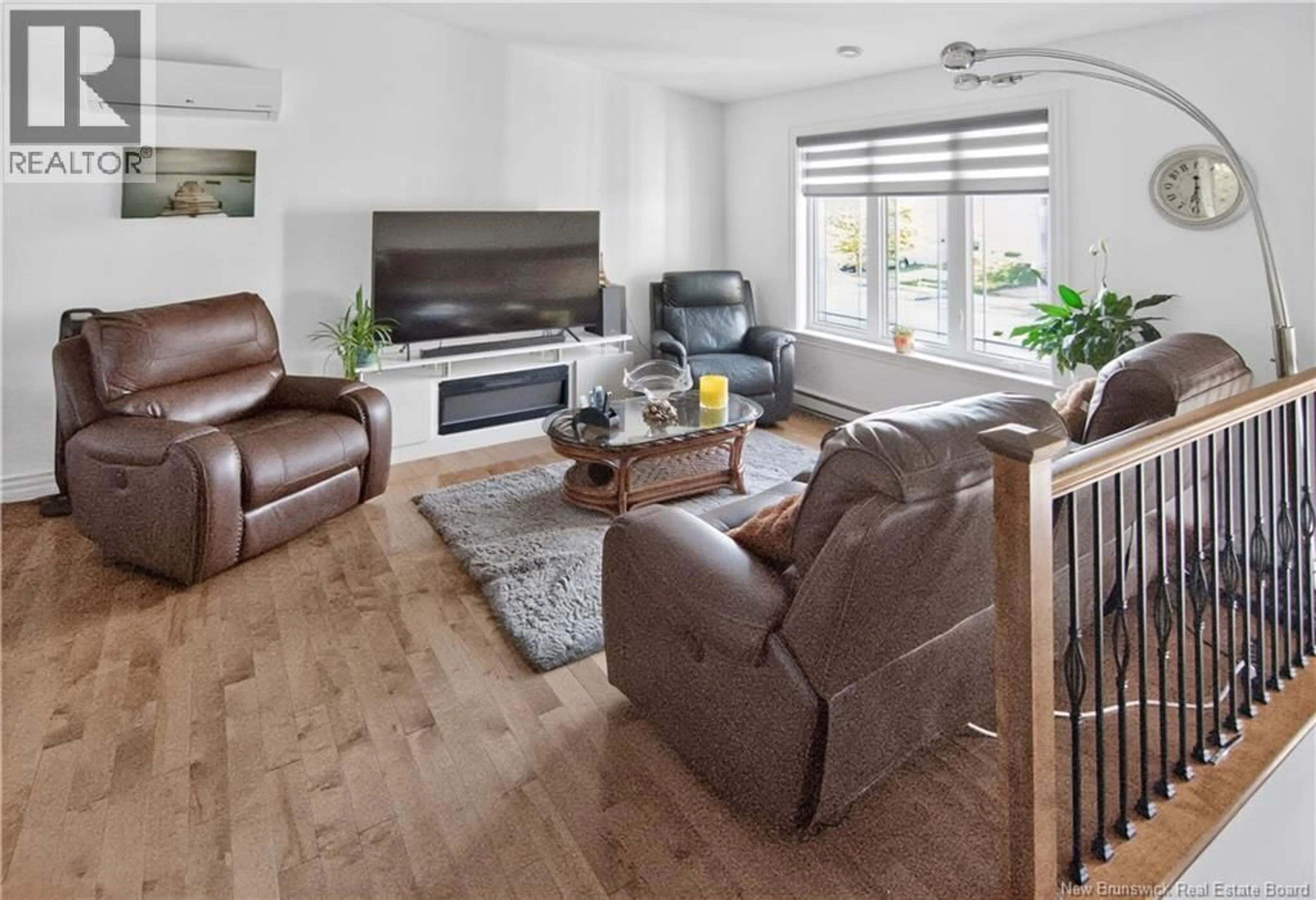 Living room with furniture, wood/laminate floor for 356 MAPLEHURST DRIVE, Moncton New Brunswick E1G0E5