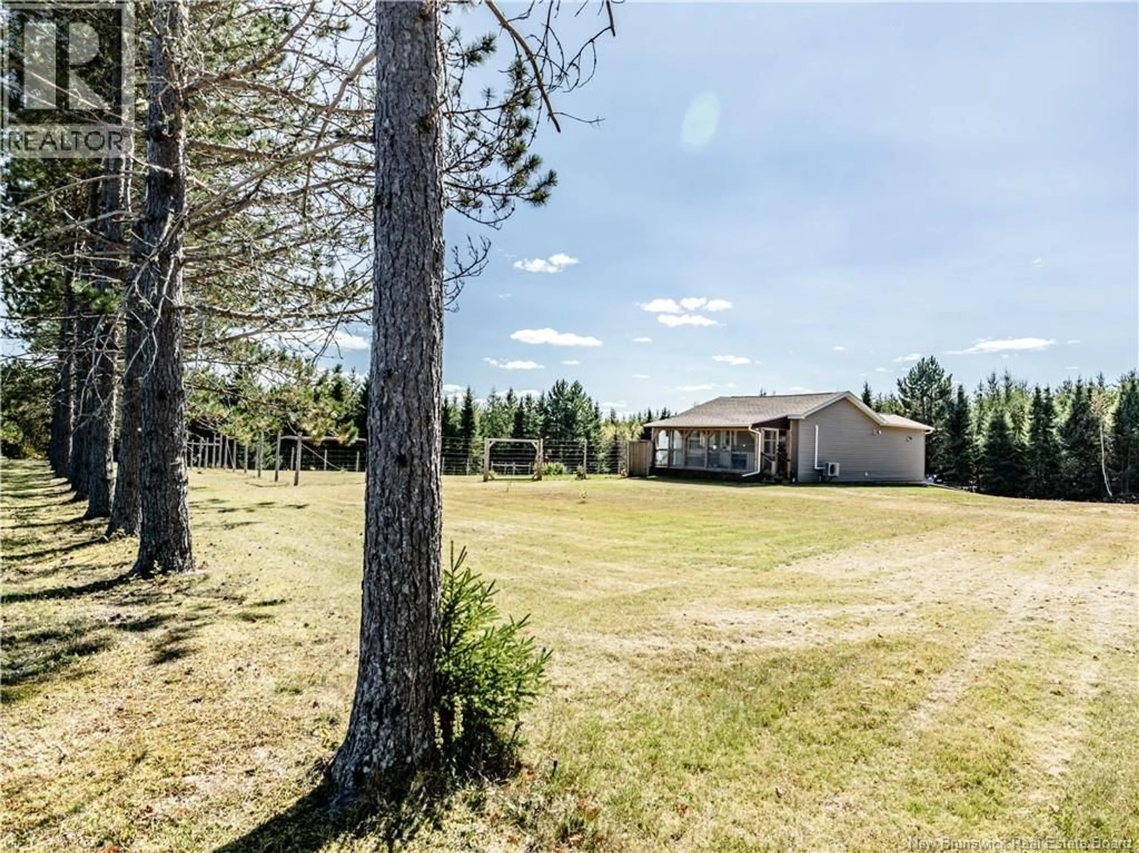 A pic from outside/outdoor area/front of a property/back of a property/a pic from drone, forest/trees view for 378 L'EGLISE, Saint-Norbert New Brunswick E4S2N3