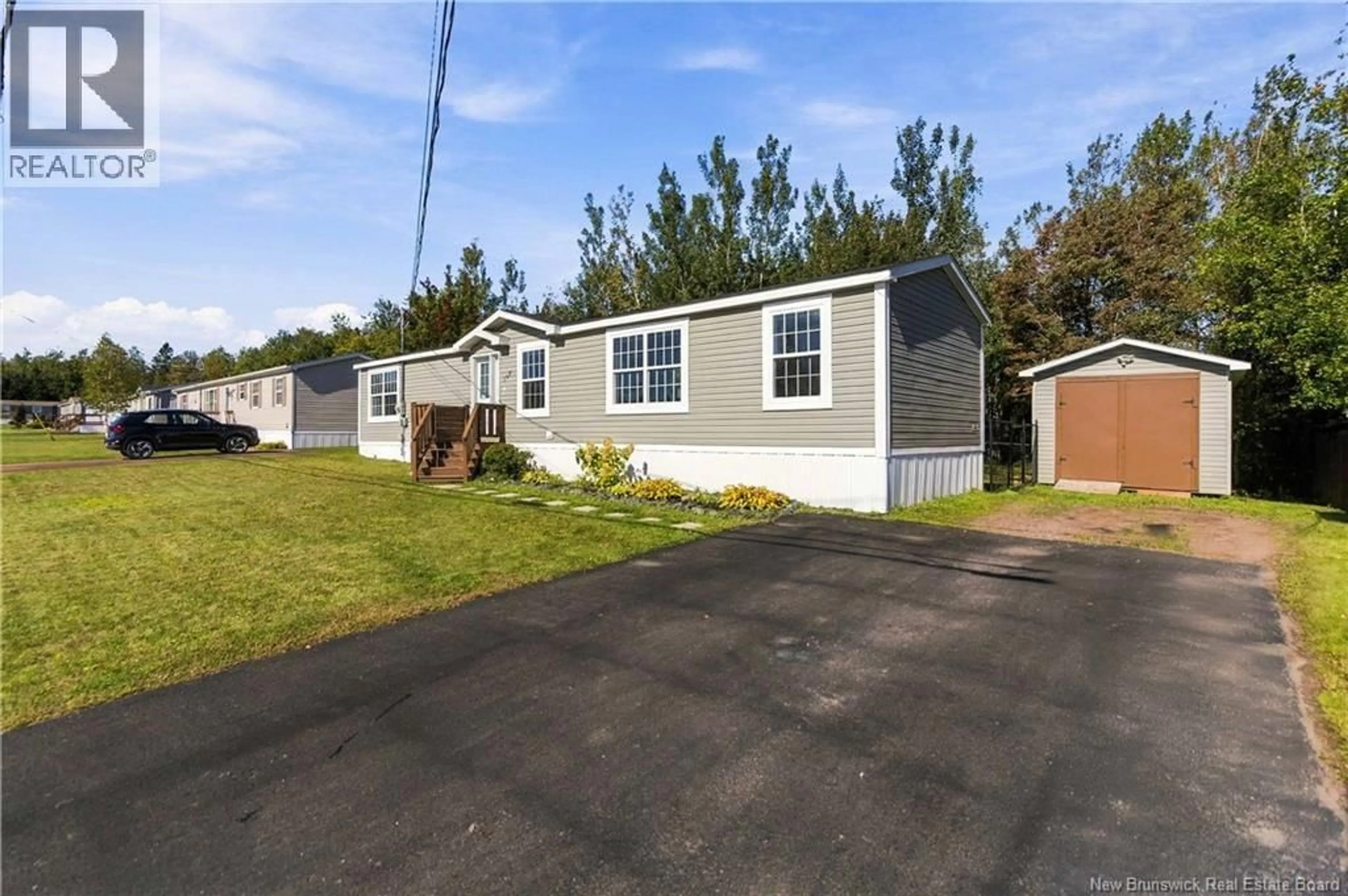 Home with vinyl exterior material, street for 590 CHAMPLAIN STREET, Shediac New Brunswick E4P9C8