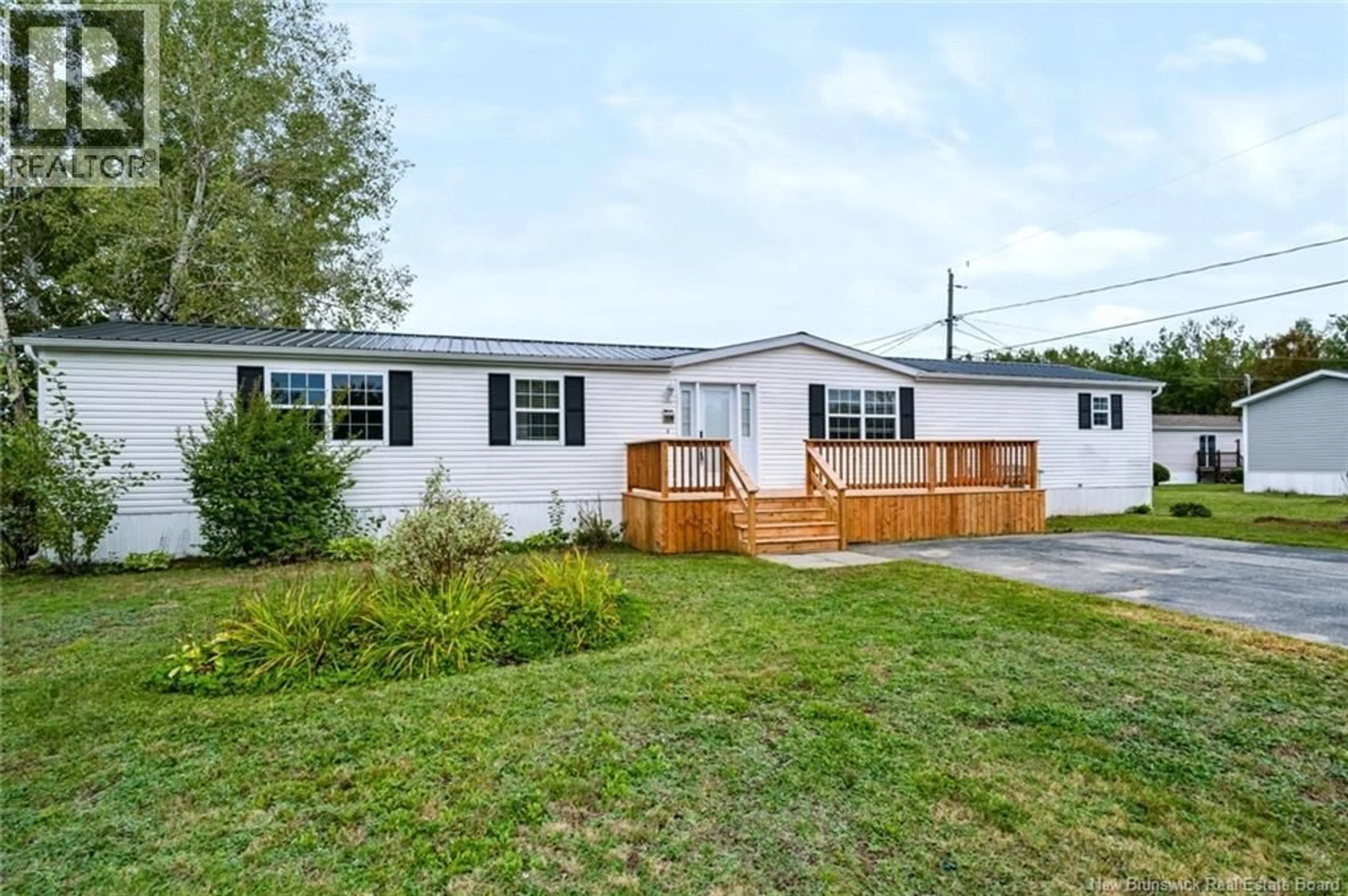 Home with vinyl exterior material, street for 729 WILLISTON DRIVE, Miramichi New Brunswick E1V6M9