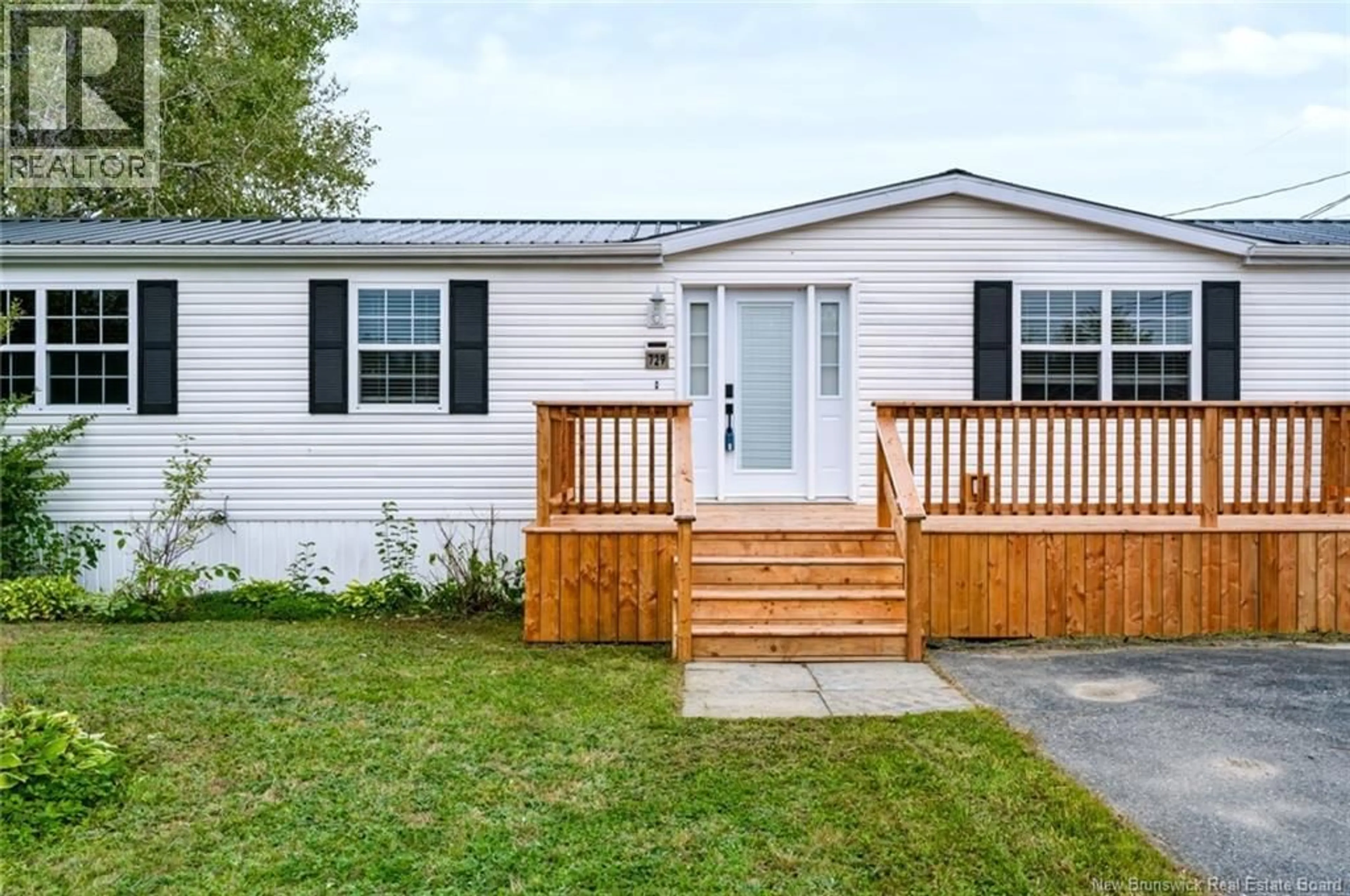 Home with vinyl exterior material, street for 729 WILLISTON DRIVE, Miramichi New Brunswick E1V6M9