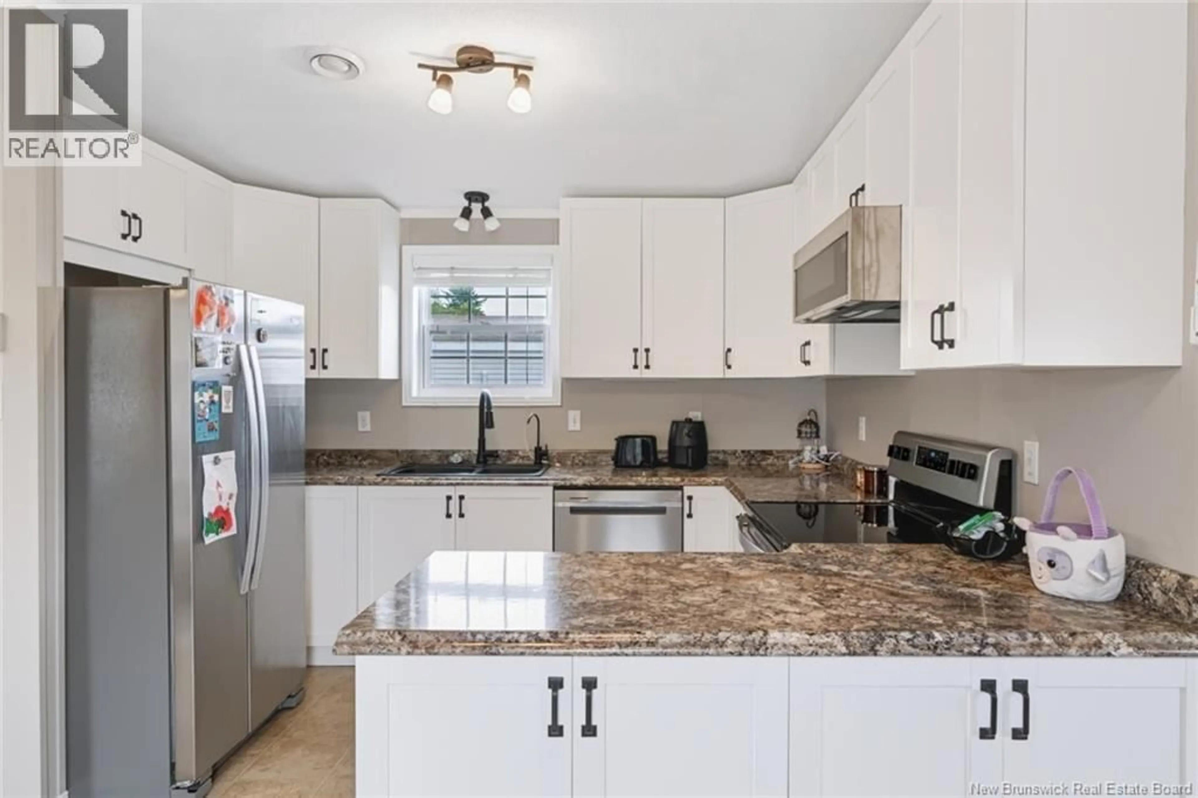 Open concept kitchen, ceramic/tile floor for 729 WILLISTON DRIVE, Miramichi New Brunswick E1V6M9