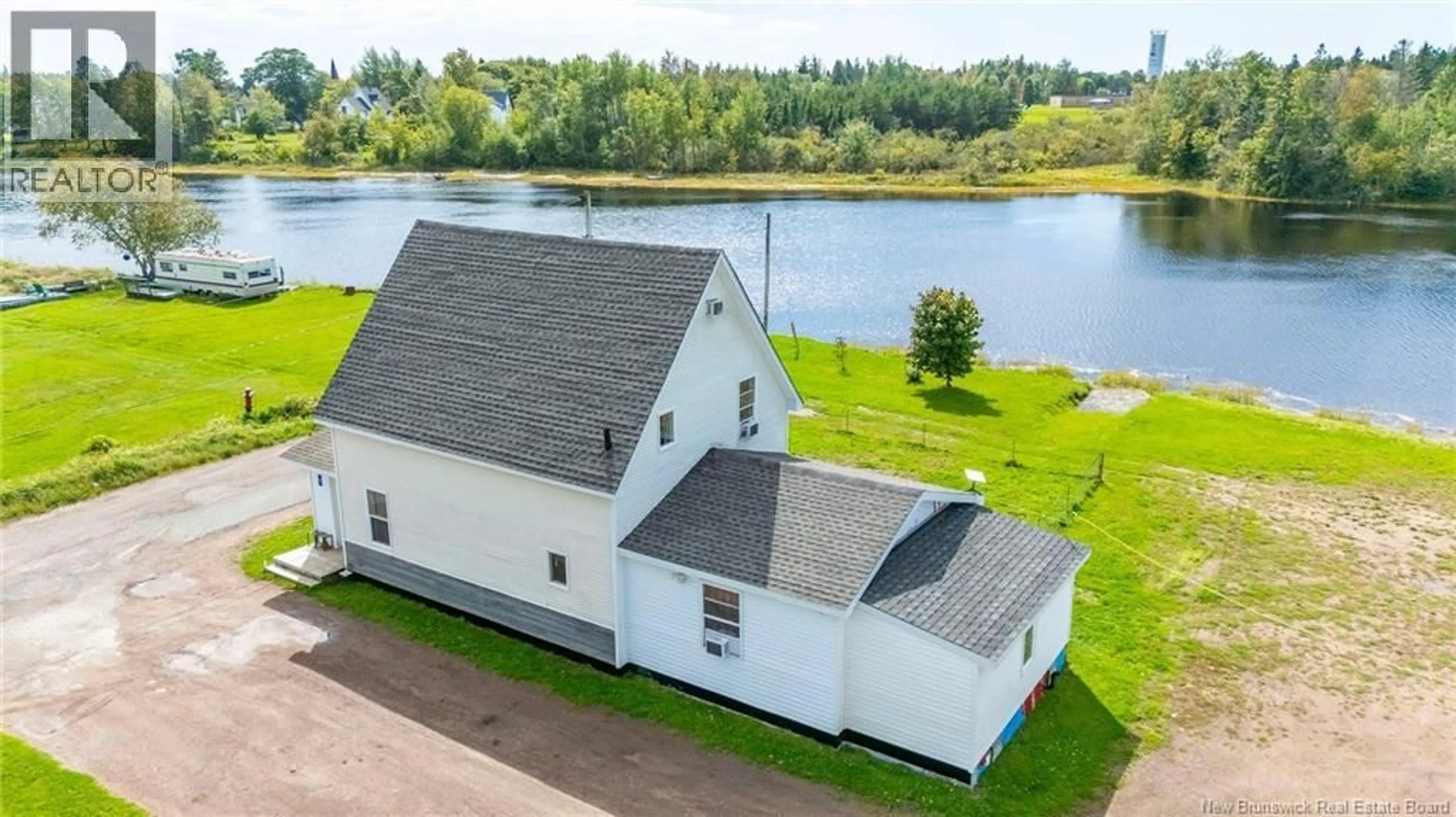 A pic from outside/outdoor area/front of a property/back of a property/a pic from drone, water/lake/river/ocean view for 7 BIRCH STREET, Port Elgin New Brunswick E4M2B9